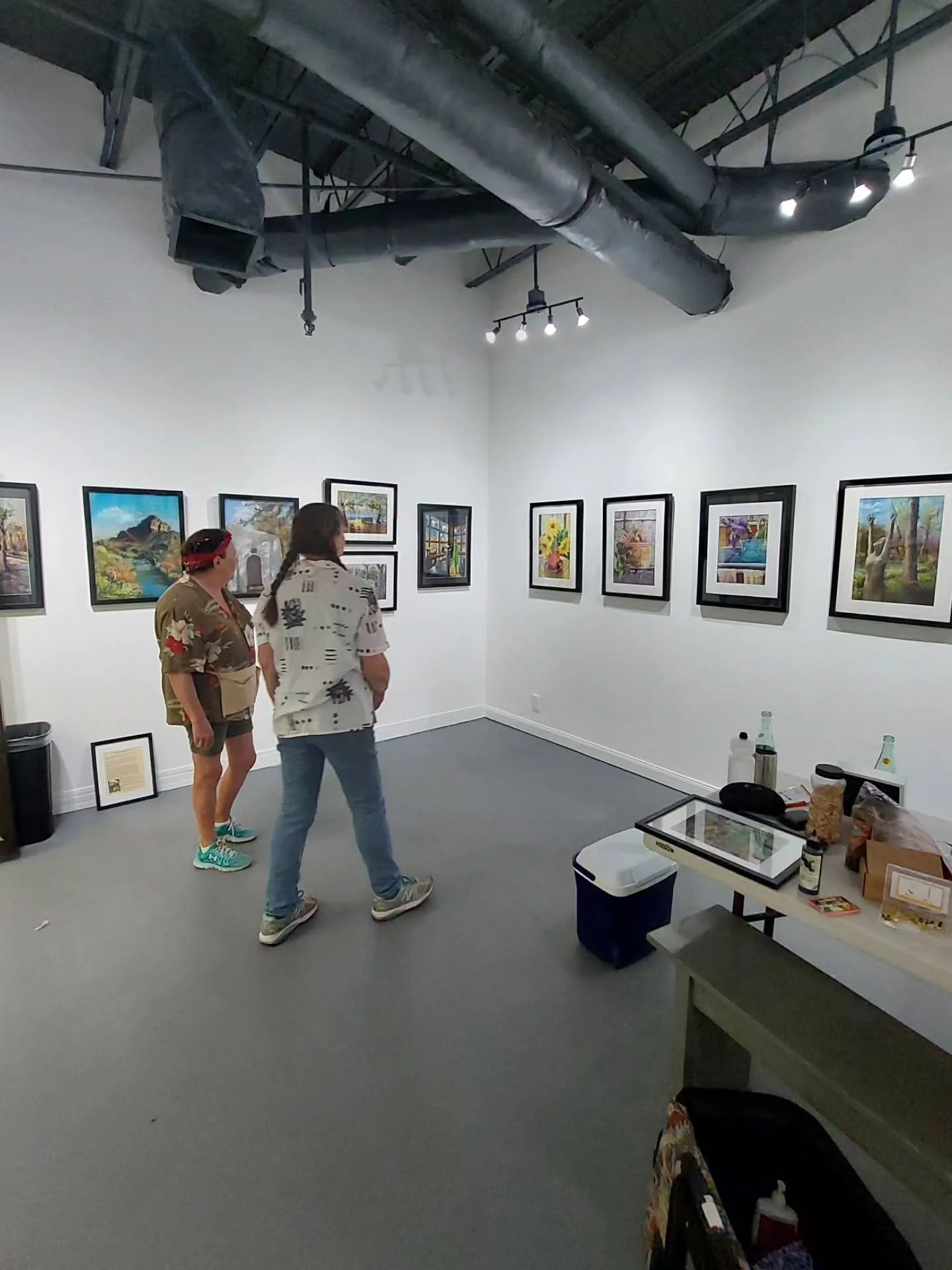 Artist Gloria Munson finished installing her new solo exhibition of paintings in the Goldmark Cultural Center's John H. Milde Gallery a few days ago! Come check out "Taking it Easel: Landscapes and Landmarks" and our other new art exhibitio