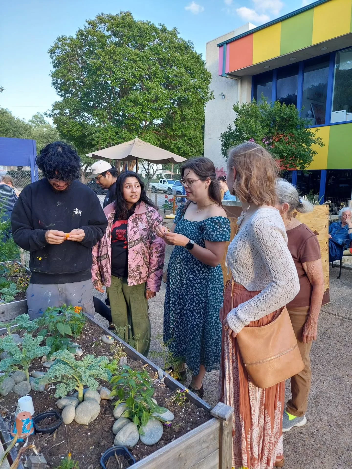 Goldmark artists admiring all the new flowers, herbs, and vegetables in our community garden during last Saturday's Goldmark Artists' Social event.

We appreciate Goldmark artist Kyle Wood @kylewoodcreations and all the other gardening volunteers in 