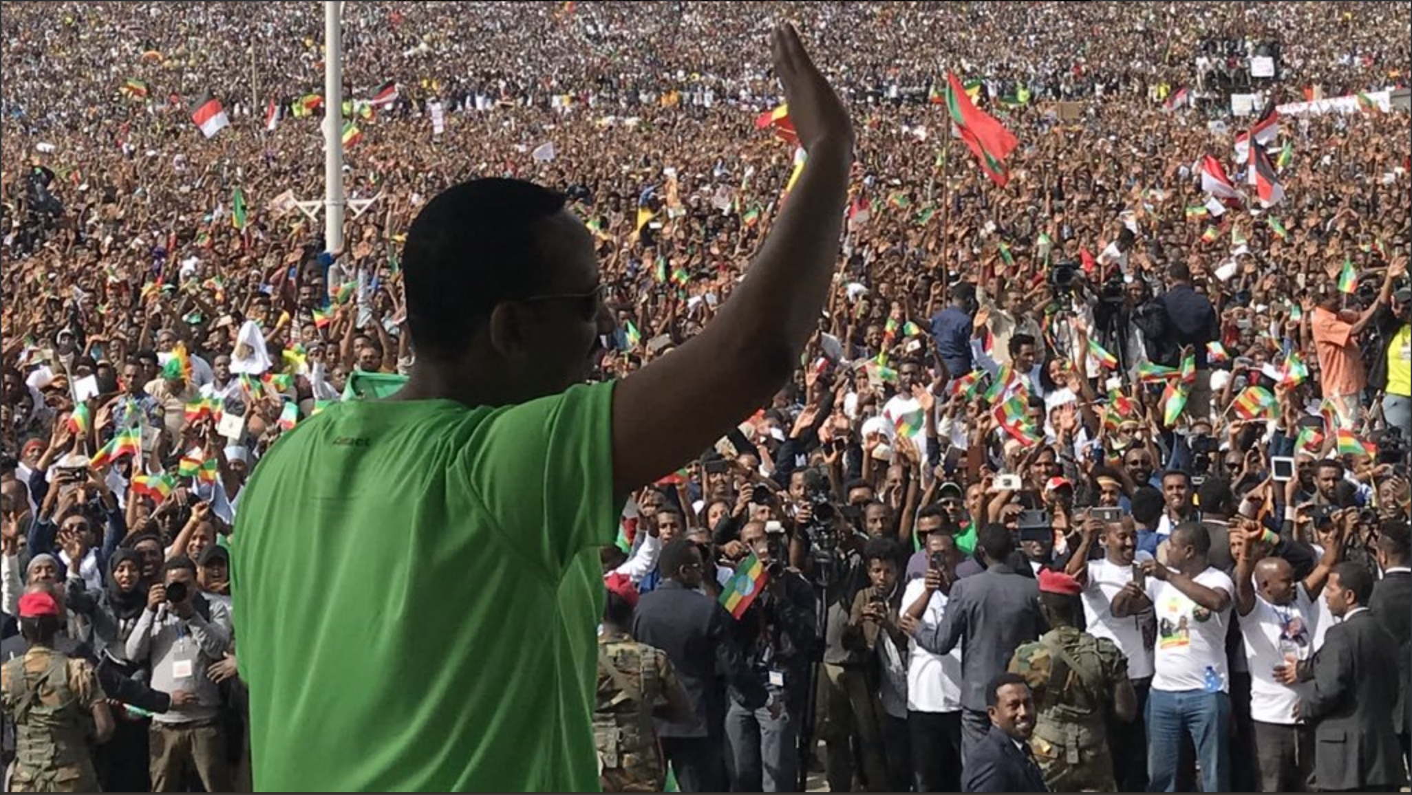Abiy Ahmed, Prime Minister of Ethiopia, waves at a rally.