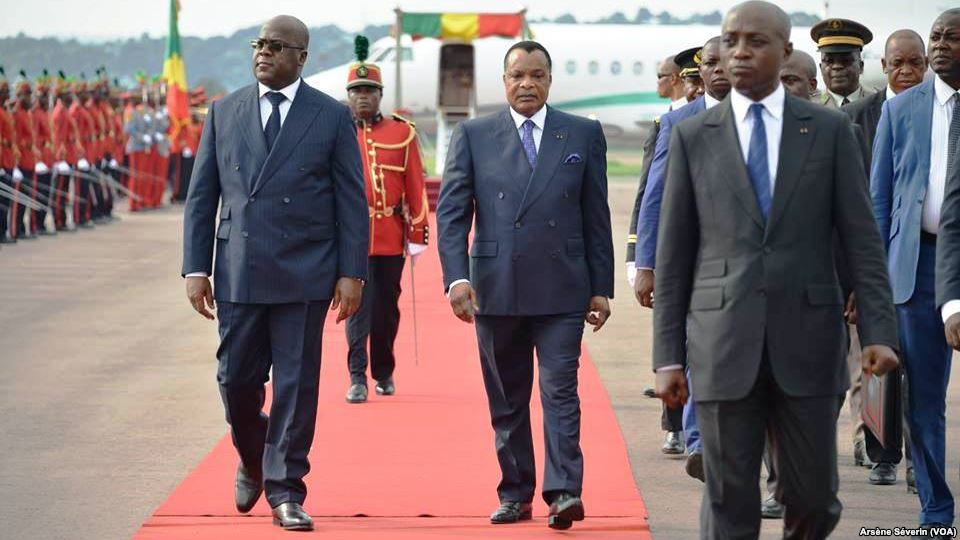 President Tshisekedi of the D.R.C. walks with other regional leaders at the Brazzaville airport. ( Wikimedia Commons)