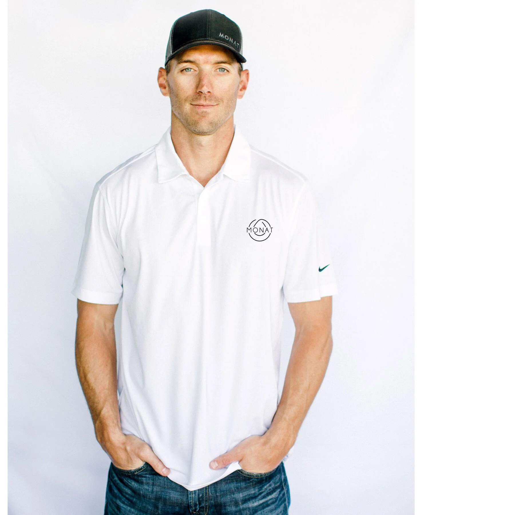 Men's white polo - skinny drop with word through the middle.jpg