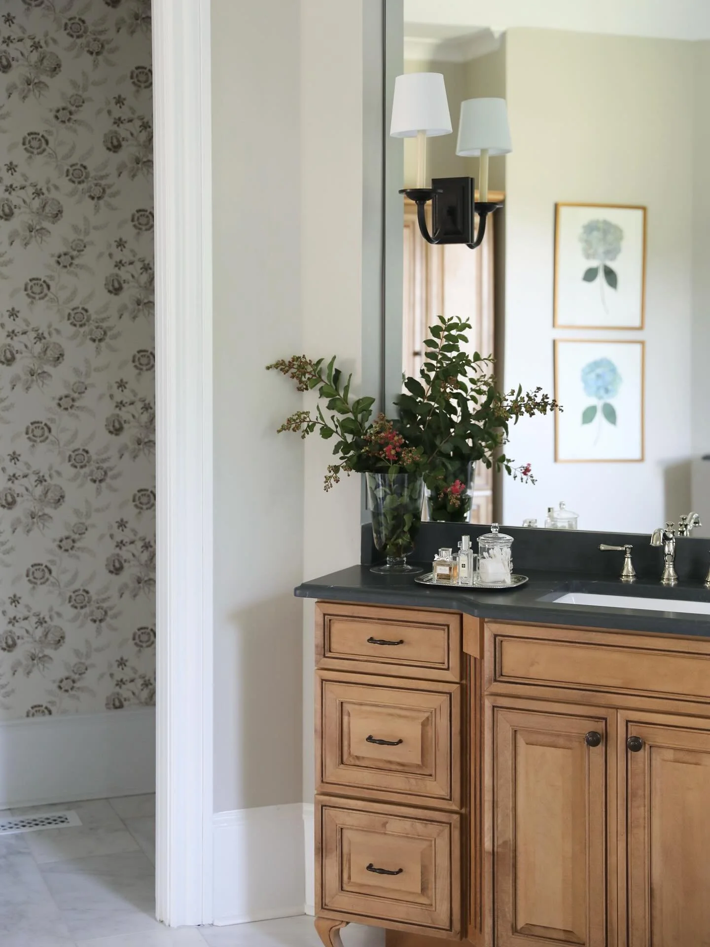 Wallpapering this water closet was a last minute addition. We love how it ended up adding such a fun pop of interest to this primary bathroom! 
&bull;
&bull;
&bull;
#interiordesigner #designinspo #bathroomdesign #primarybathroom #atlantadesigner #ath