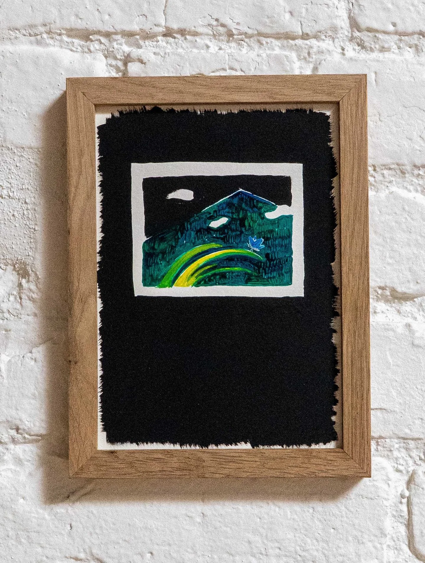 Big/Small
Delicate/Sturdy
Light/Heavy

things together at once 

A little symbol drawing called &ldquo;Postcard&rdquo; with a butterfly balanced on a blade of grass in front of a mountain. Three white clouds float in the sky.