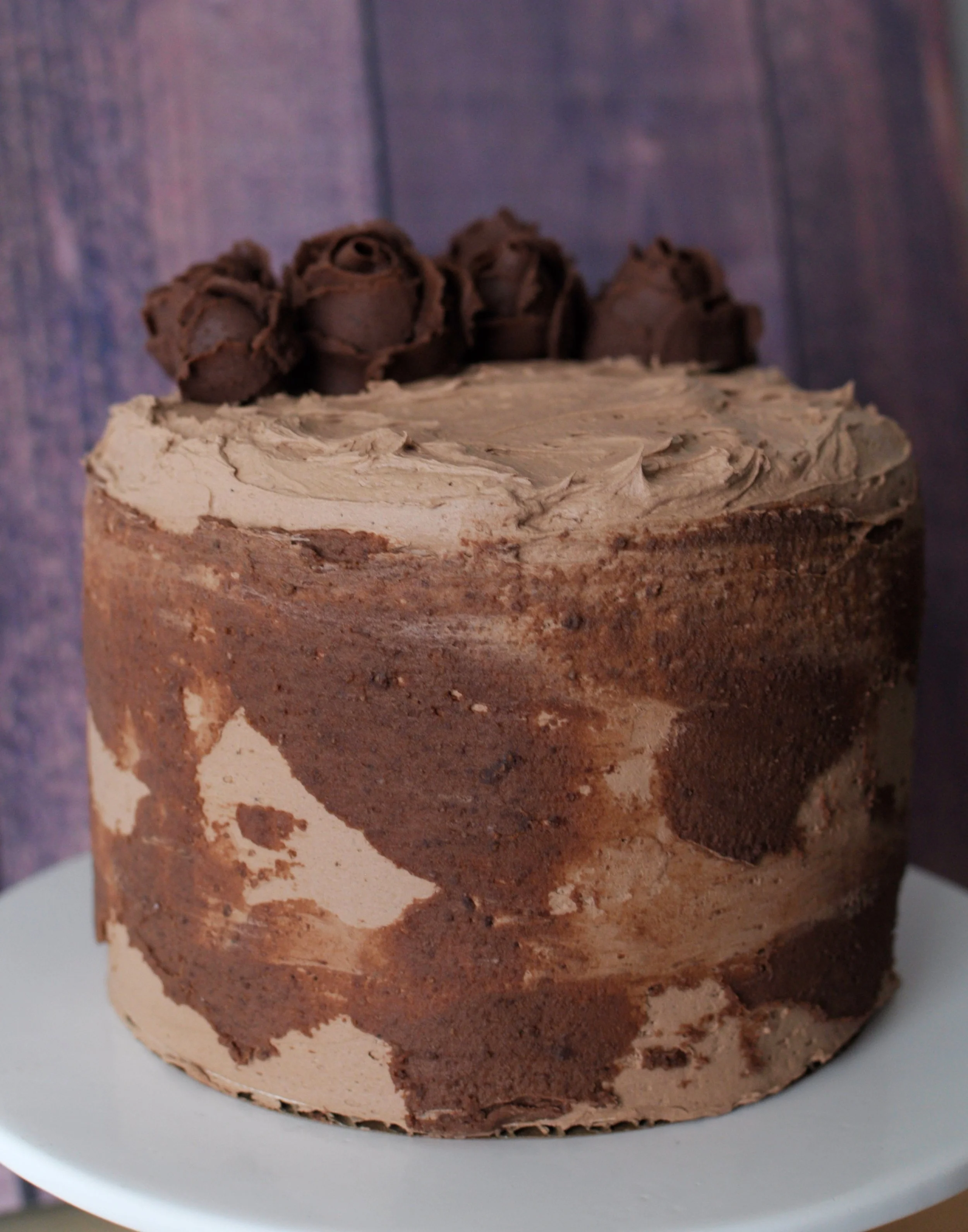 Chocolate/Hazelnut with piped Chocolate Buttercream Roses. ($65-80)
