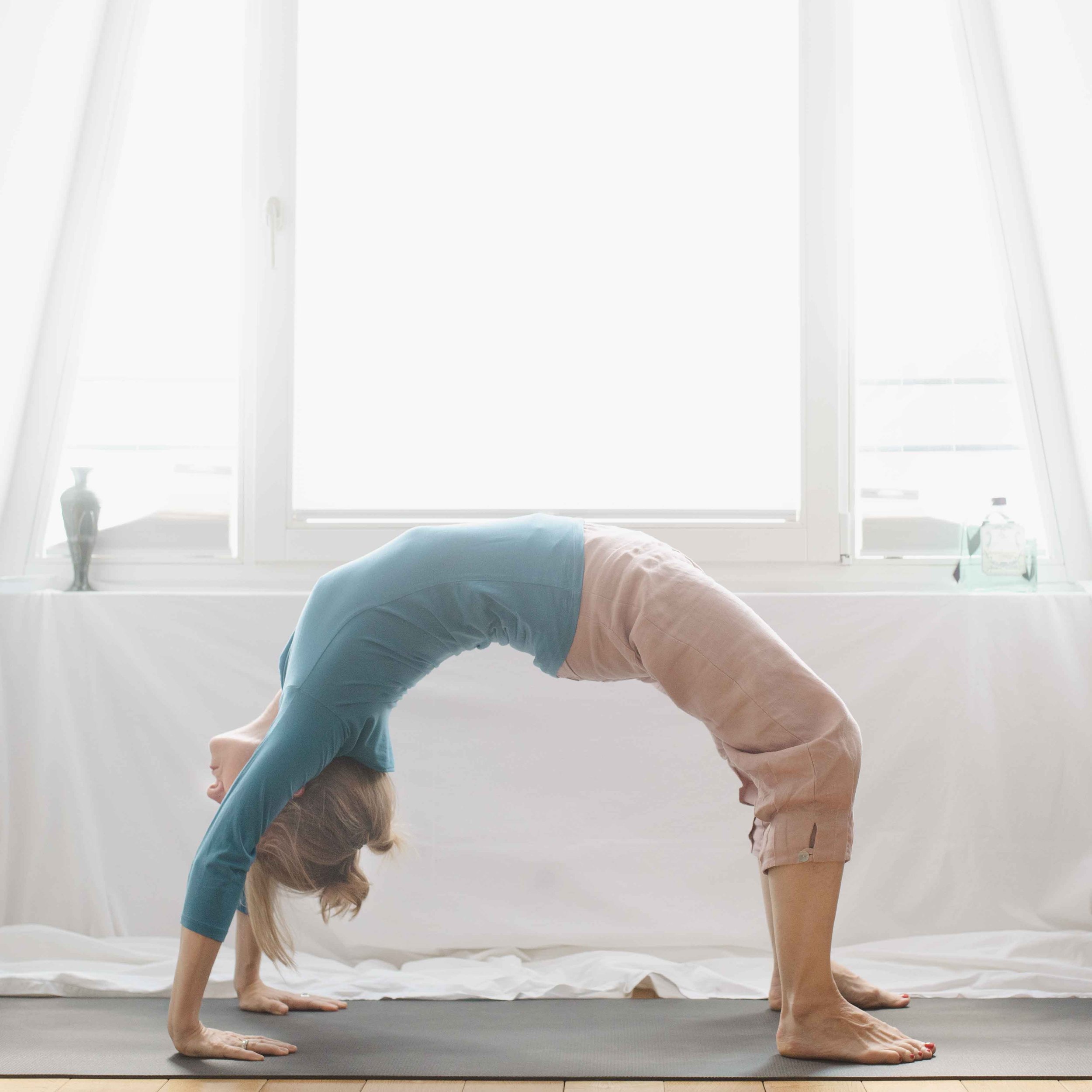 14 Best Yoga Stretches To Do Daily To Be More Flexible Per An Expert