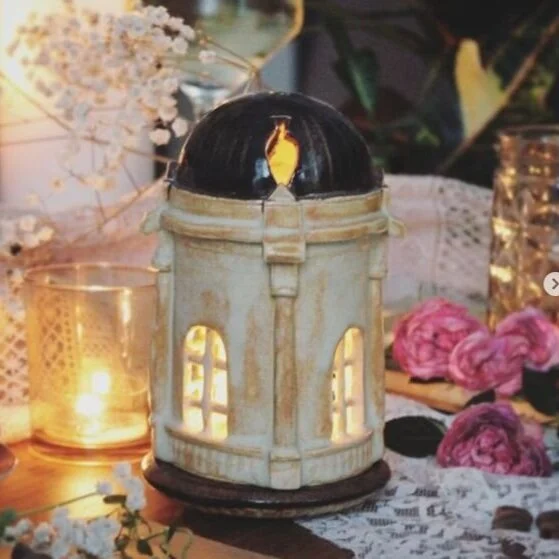 Ceramics lamp with candle by Irina Heikkinen Light flickers through the ceramic lamp windows, casting warm light when the candle is burning inside. The tea light candle is comfortable &amp; safe. The lower part securely fixes the tea light candle. T…