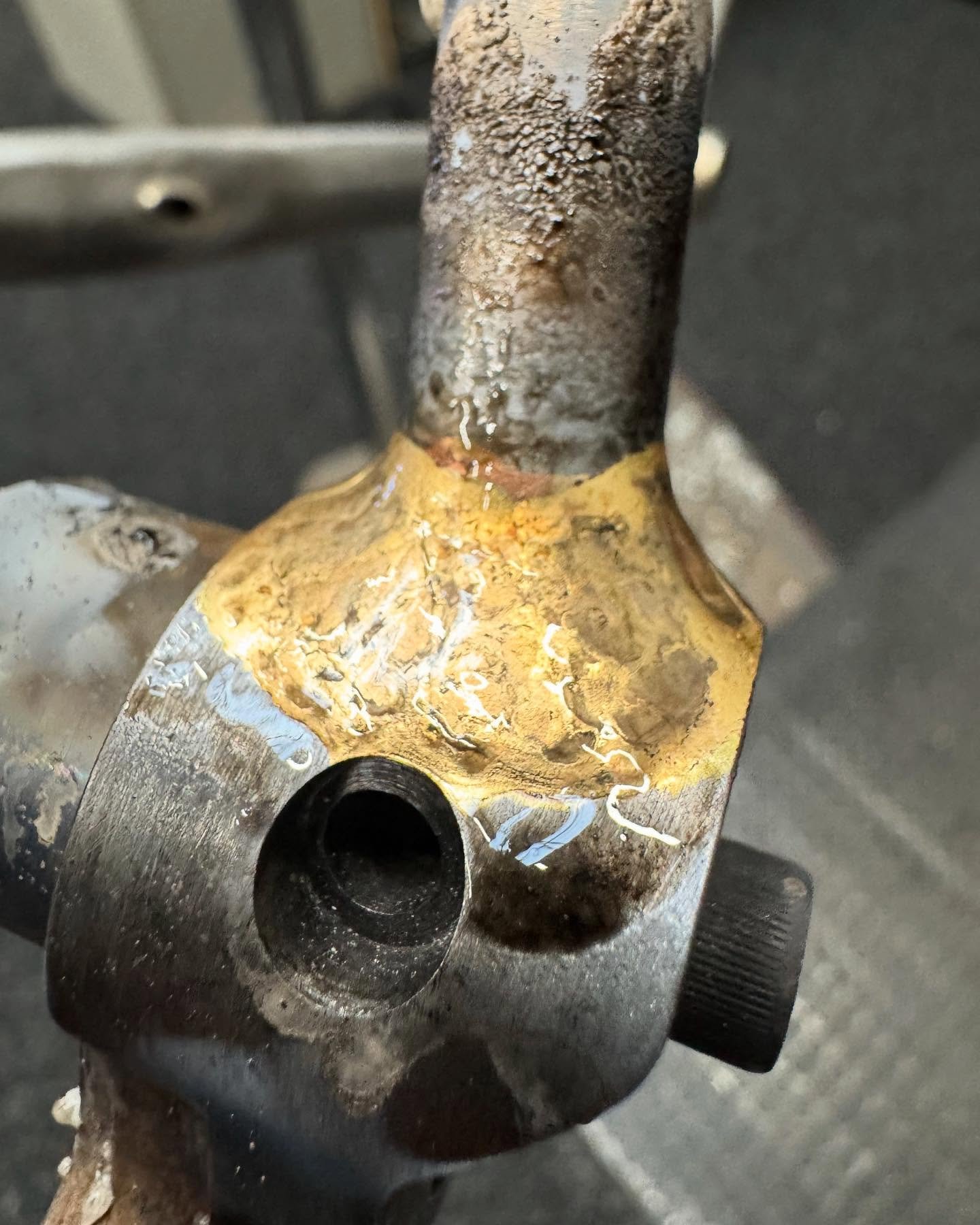 Joining thin tube to really thick material is probably the trickiest part of a frame build. You need so much heat to get these dropouts up to temp and the tubing is desperately trying to heat up too, torch control is everything or the tube is burnt s
