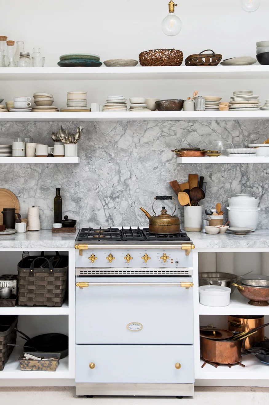 shelves-full-of-props-in-this-backyard-photo-studio-tour-on-coco-kelley-.jpg