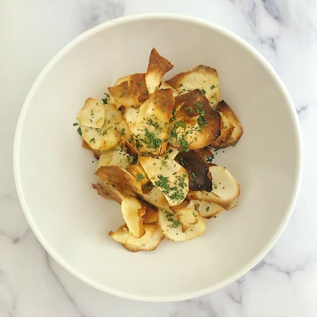 YUCA CHIPS ⠀
⠀
&bull; Peel yuca⠀
⠀
&bull; Slice using the mandolin. Preheat your oven to 375⠀
⠀
&bull; lay flat on parchment paper or a sil-pat⠀
⠀
&bull; spray with avocado oil and sprinkle with your homemade delicious addictive spice blend⠀
⠀
&bull;
