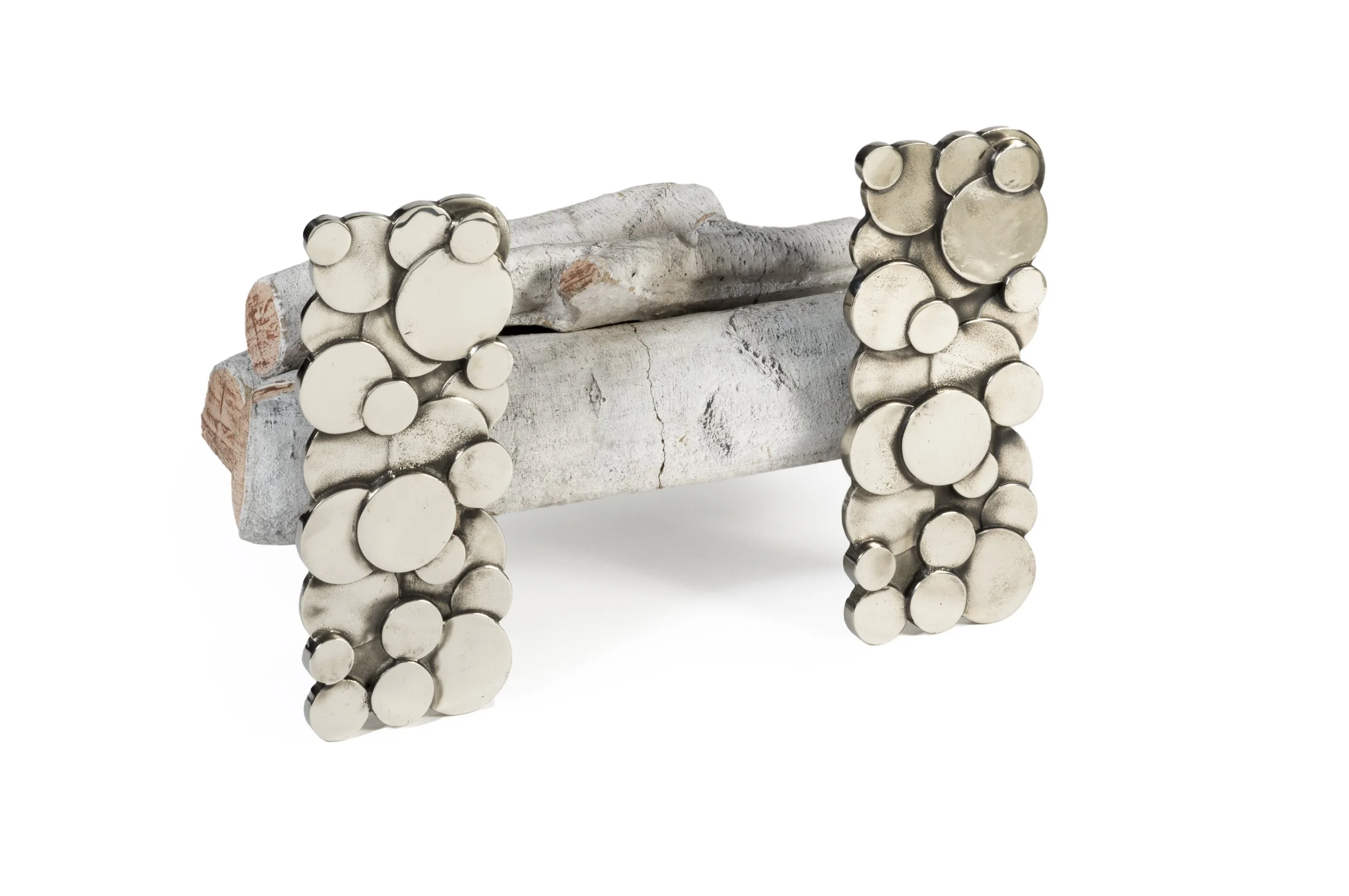 Alexandra Andirons in white bronze, angled side view with circular stacked design