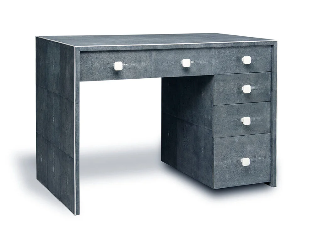 Angled view of Clark desk in Onyx Shagreen with seven drawers and bone handles.