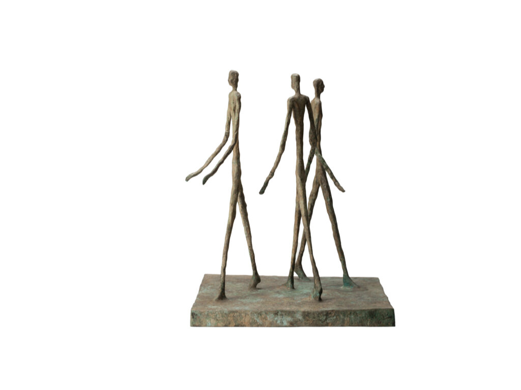 bronze sculpture of three male figures by John Lyle