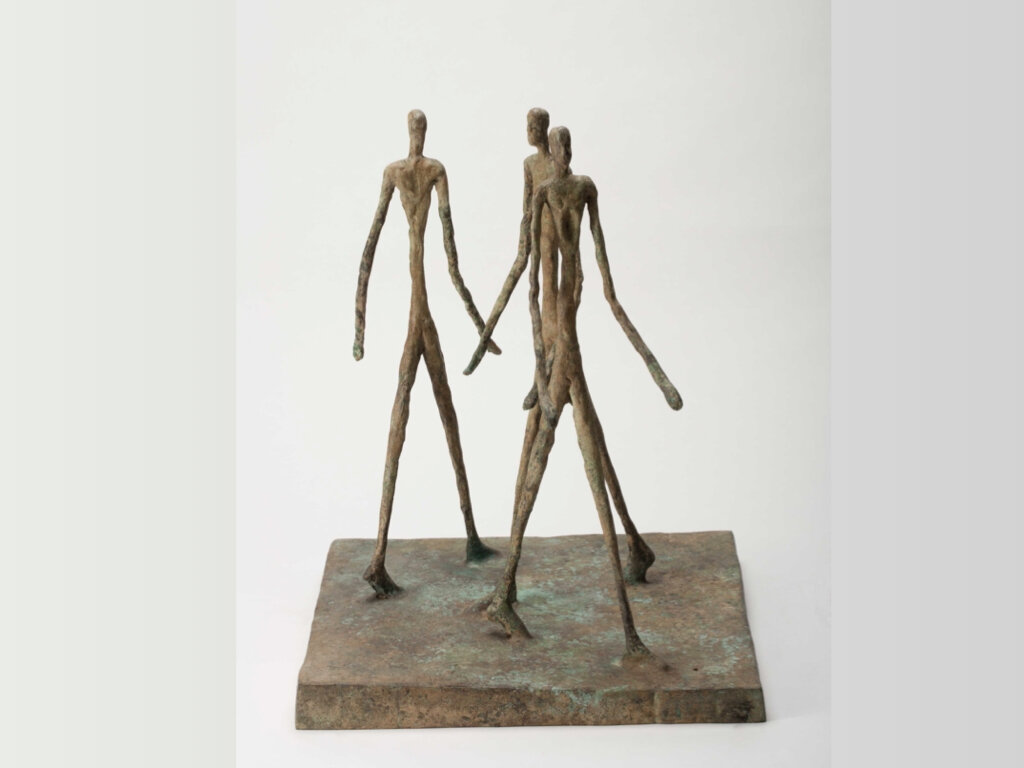 bronze sculpture of 3 male figures by John Lyle