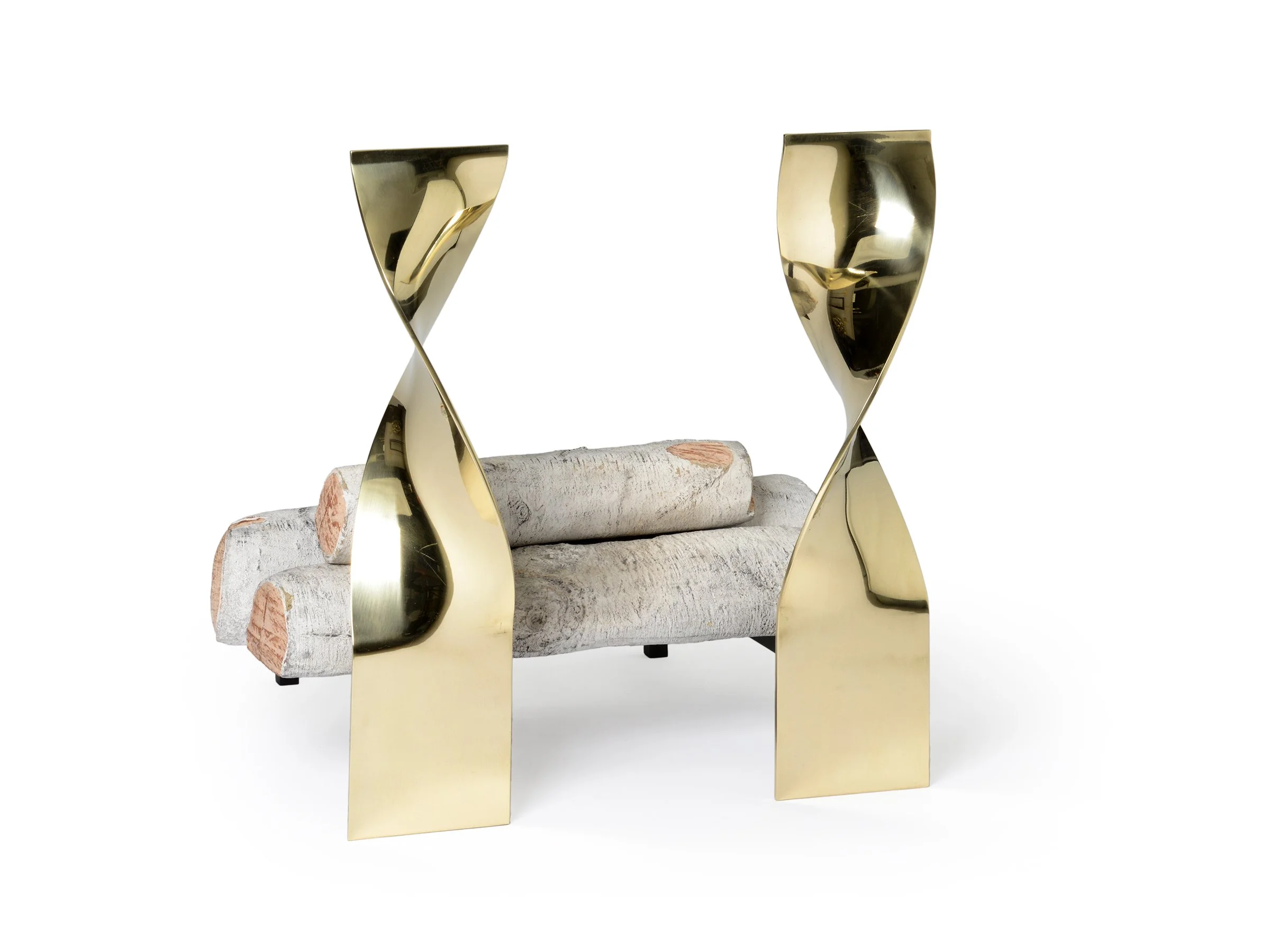Angled view of Aston Andirons in polished bronze with birch logs.