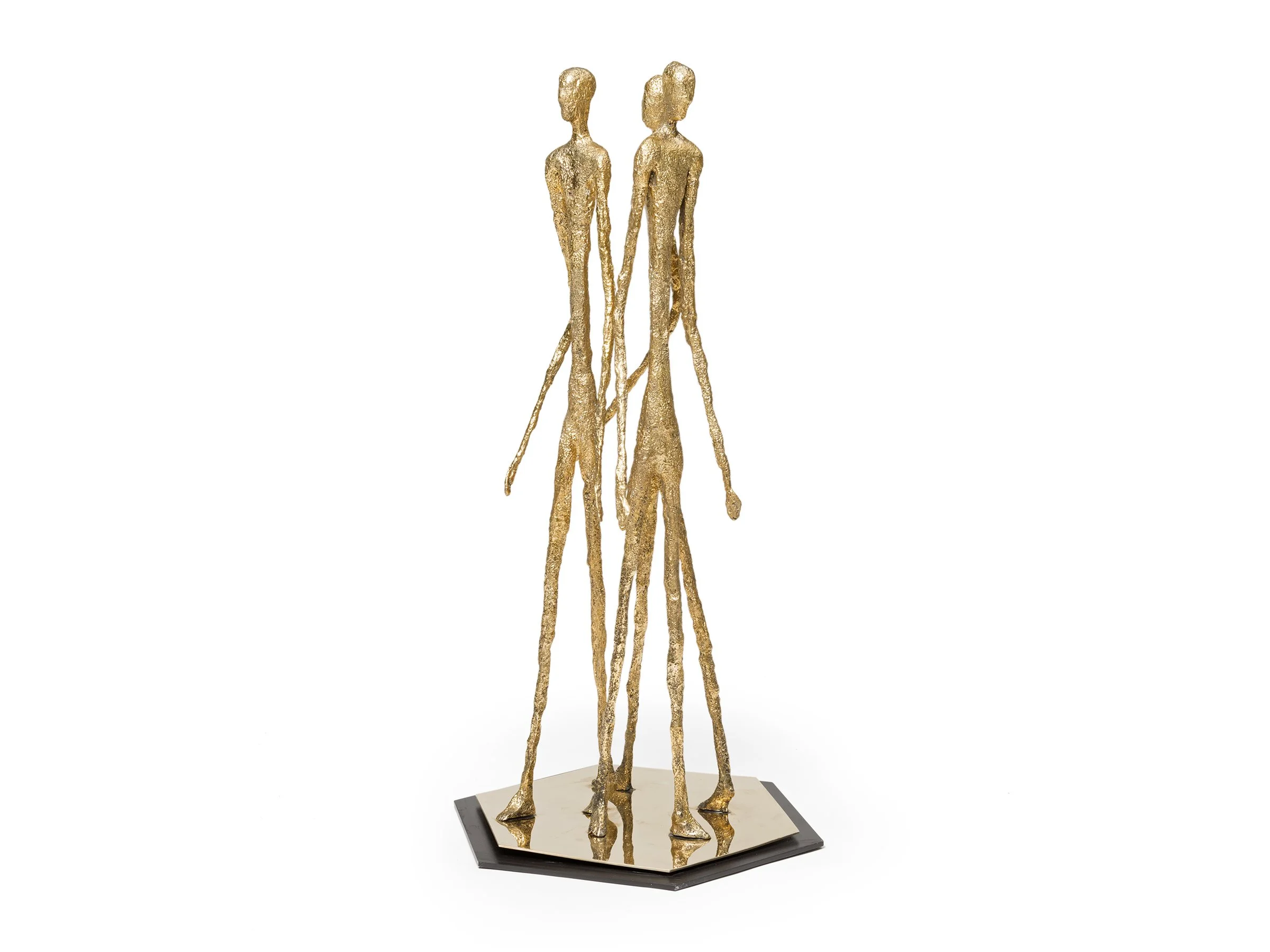 Full view of The Cyclad Sculpture with three abstract figures standing on a reflective geometric base.