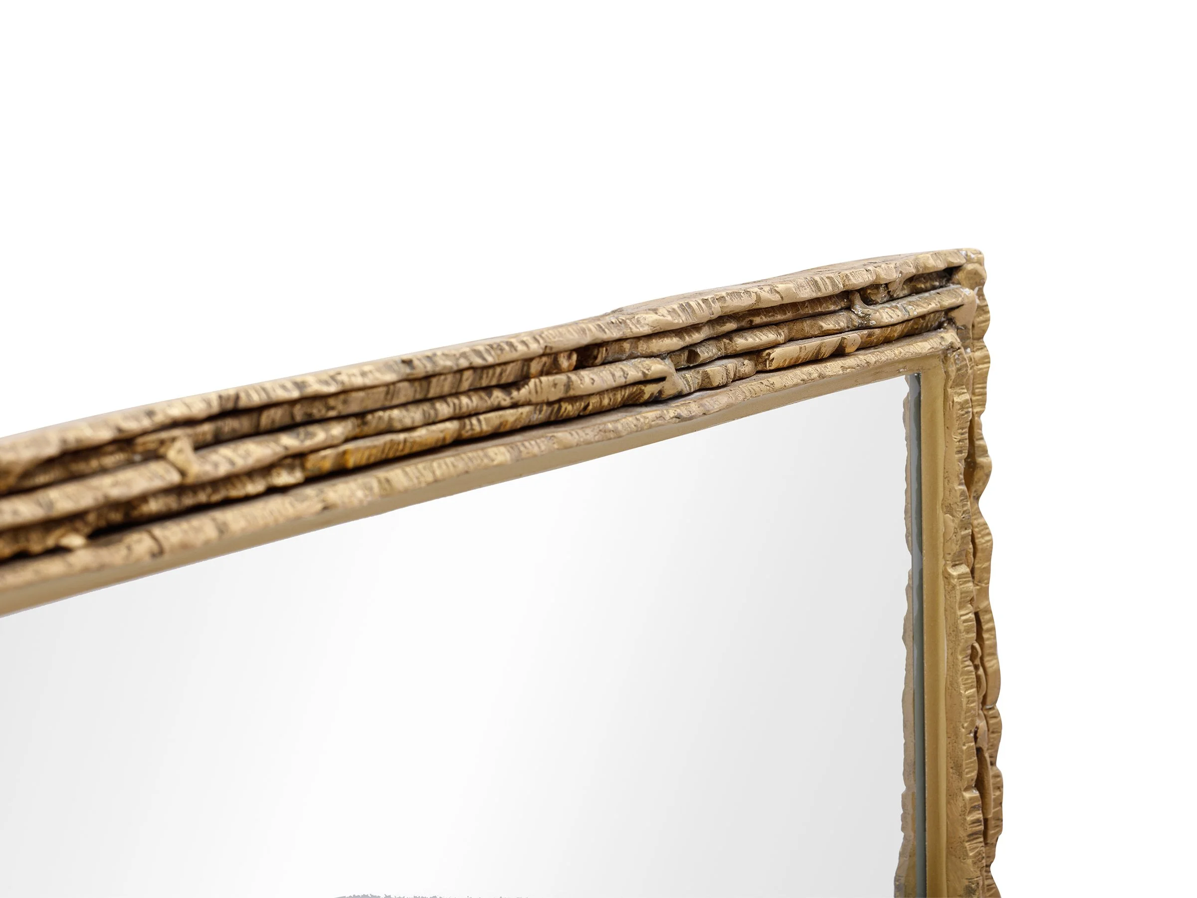 Detail shot of upper corner of Ingot Mirror frame with tactile bronze finish