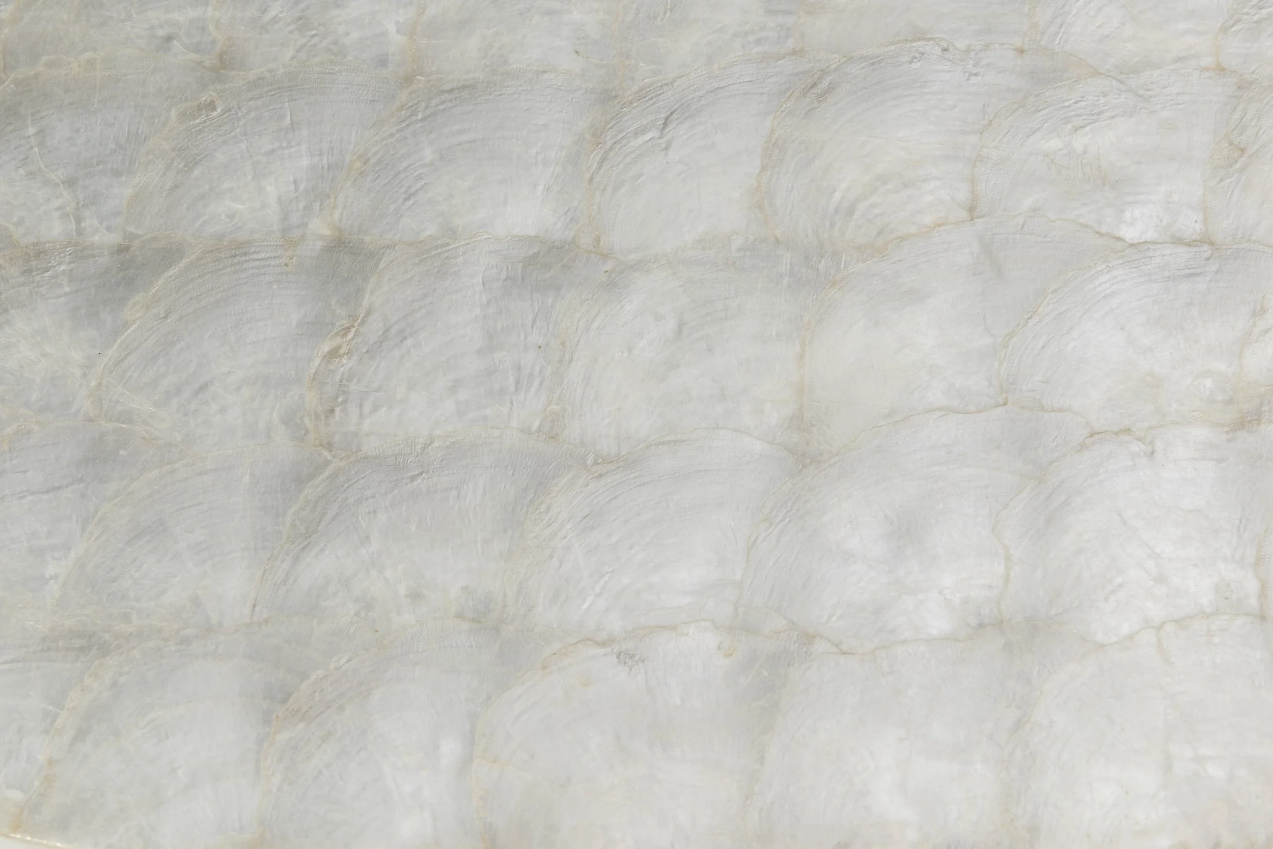 Detail of The Rita Stand's capiz shell finish