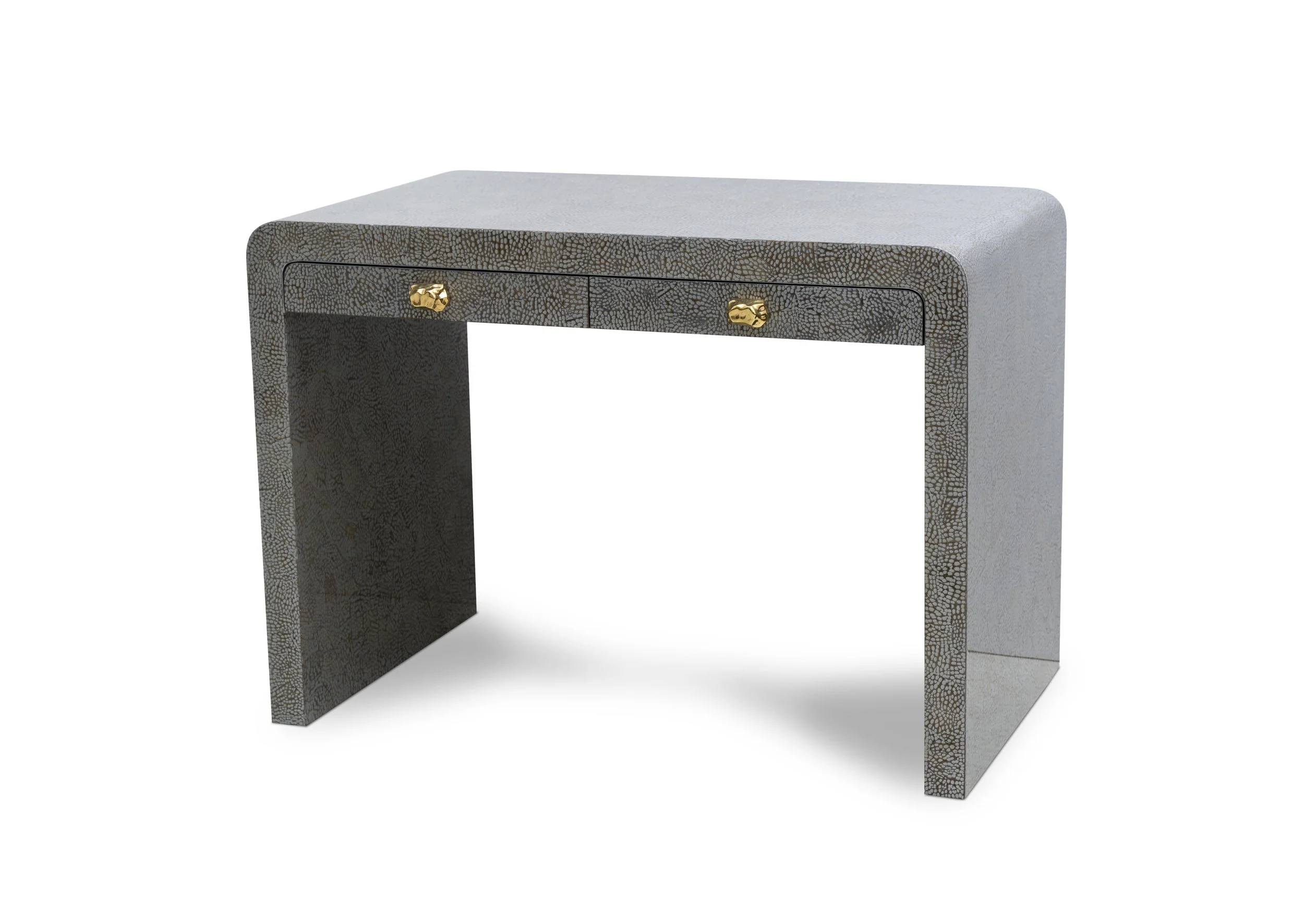 Angled view of Horizon Desk in silver snakeskin eggshell lacquer with bronze pulls