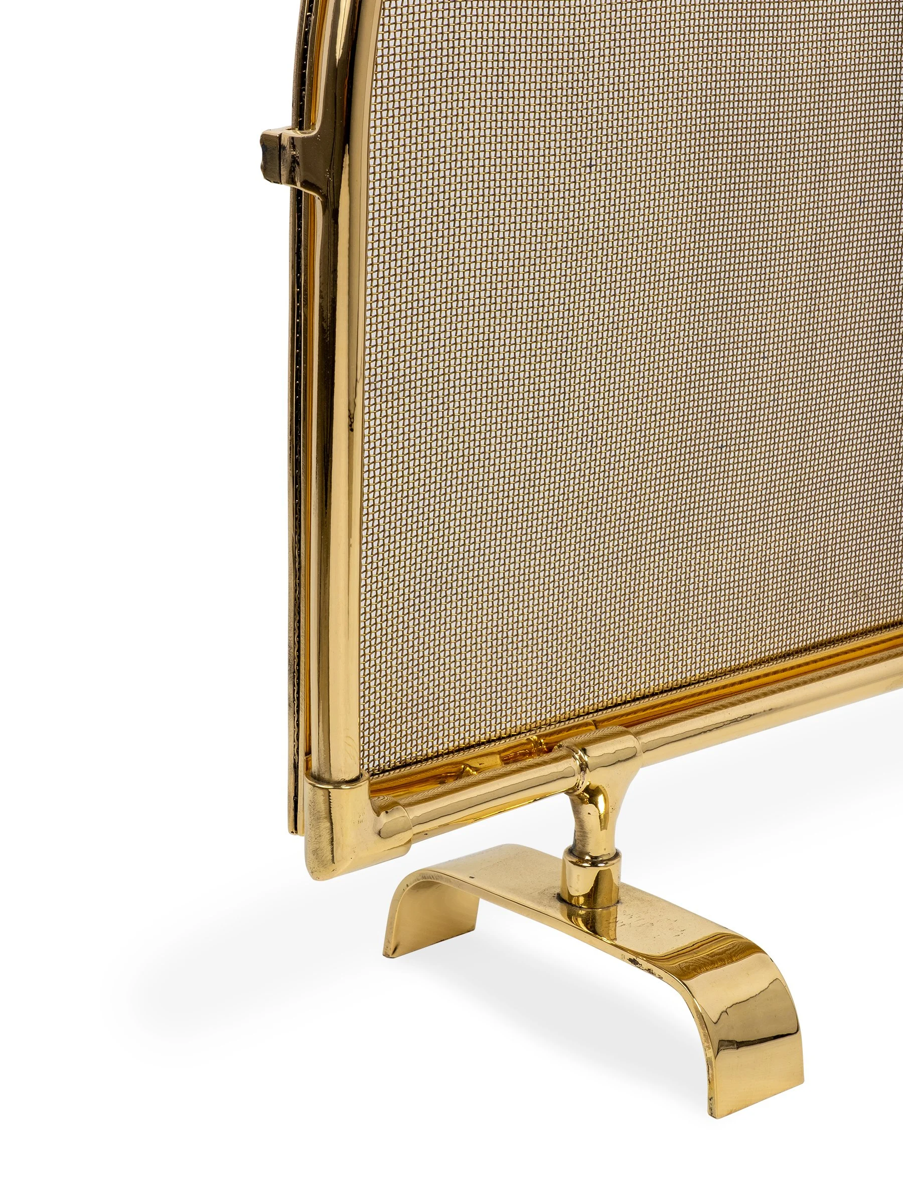 Arch Fire Screen with polished bronze frame and mesh insert, detail view