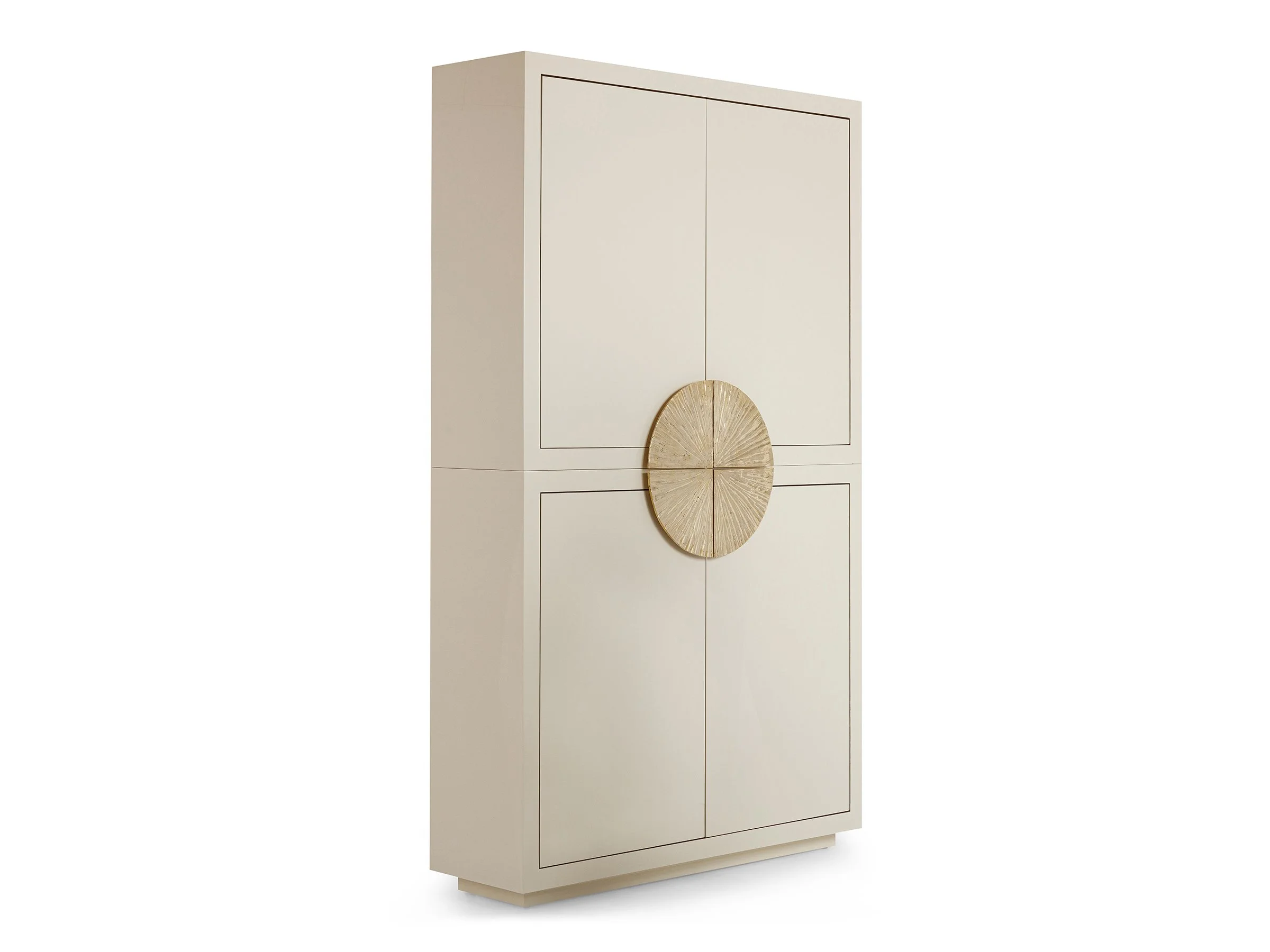 The Soleil Armoir in biscuit lacquer with polished bronze sunburst hardware, angle view