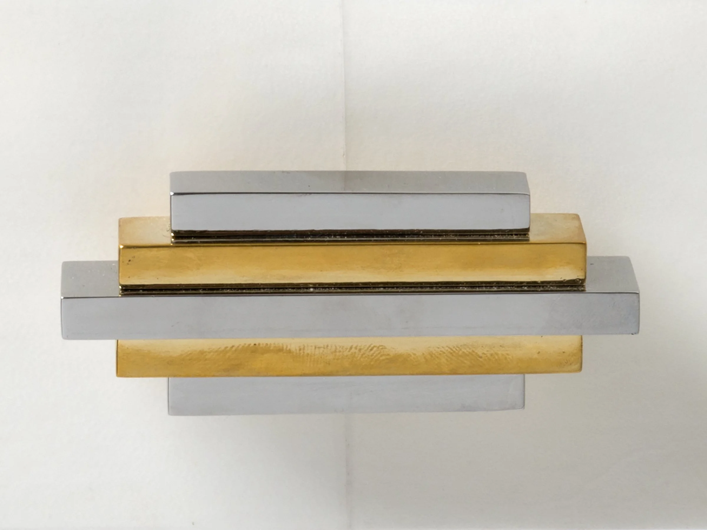 Century Stand drawer open showing two-toned bronze “Century” handle – detail view