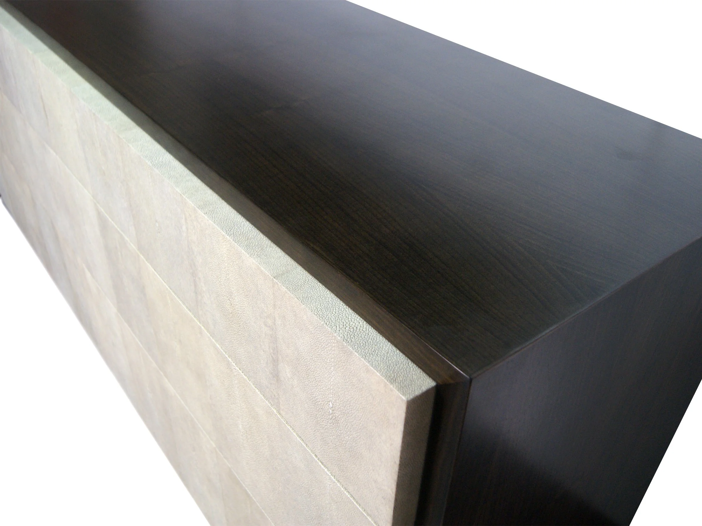Angled view of the William chest in Dark Walnut and Antique Shagreen drawer fronts.