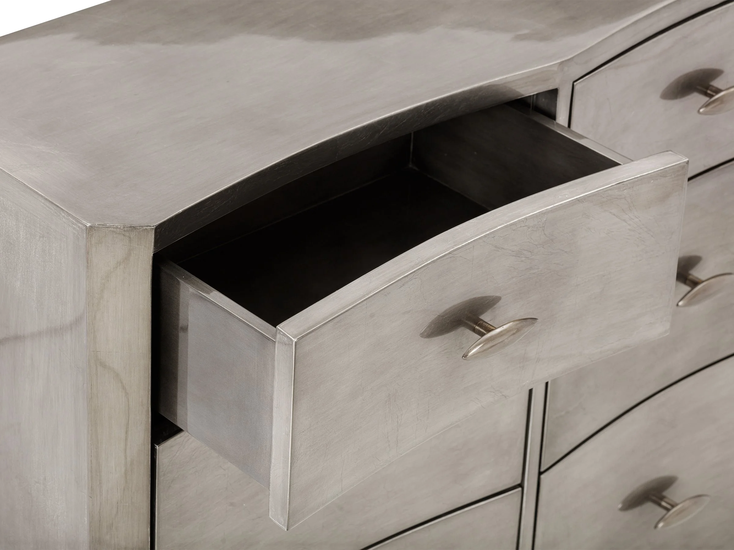 New Wave Dresser with drawers partially open, showing metallic sculpted fronts