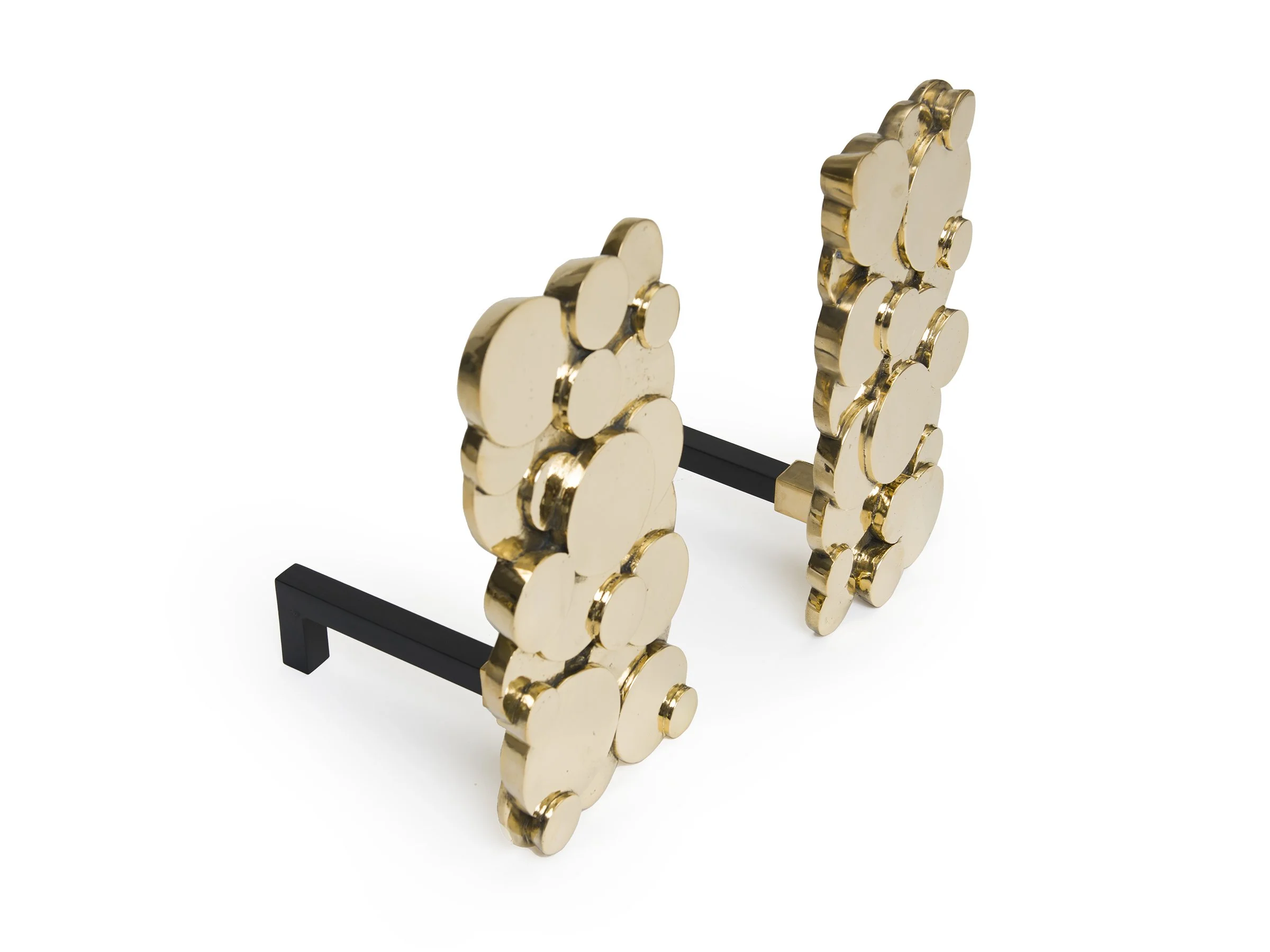 Alexandra Andirons in polished bronze, angled side view with circular stacked design