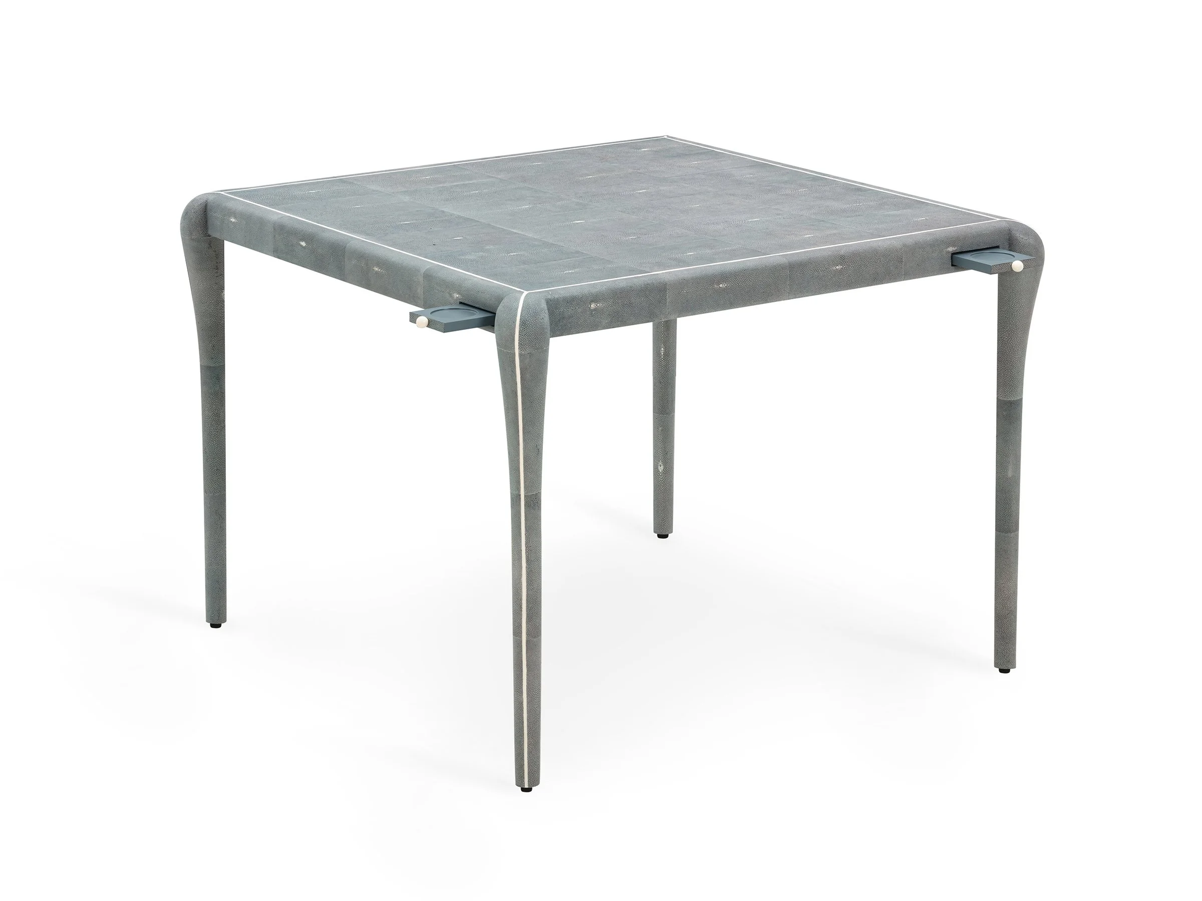Angled view of Classical Game Table in New Navy shagreen with optional drink holders extended