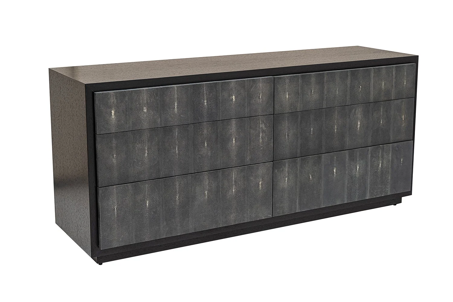 Angled view of the William Chest in Dark Walnut with Onyx Shagreen drawer fronts.