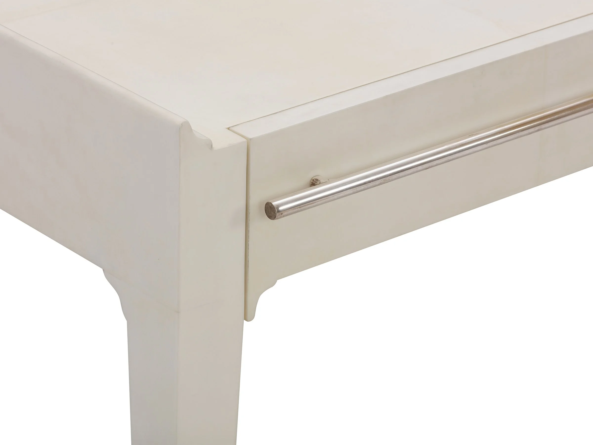 The I Desk close up showing bleached parchment finish and bronze handles