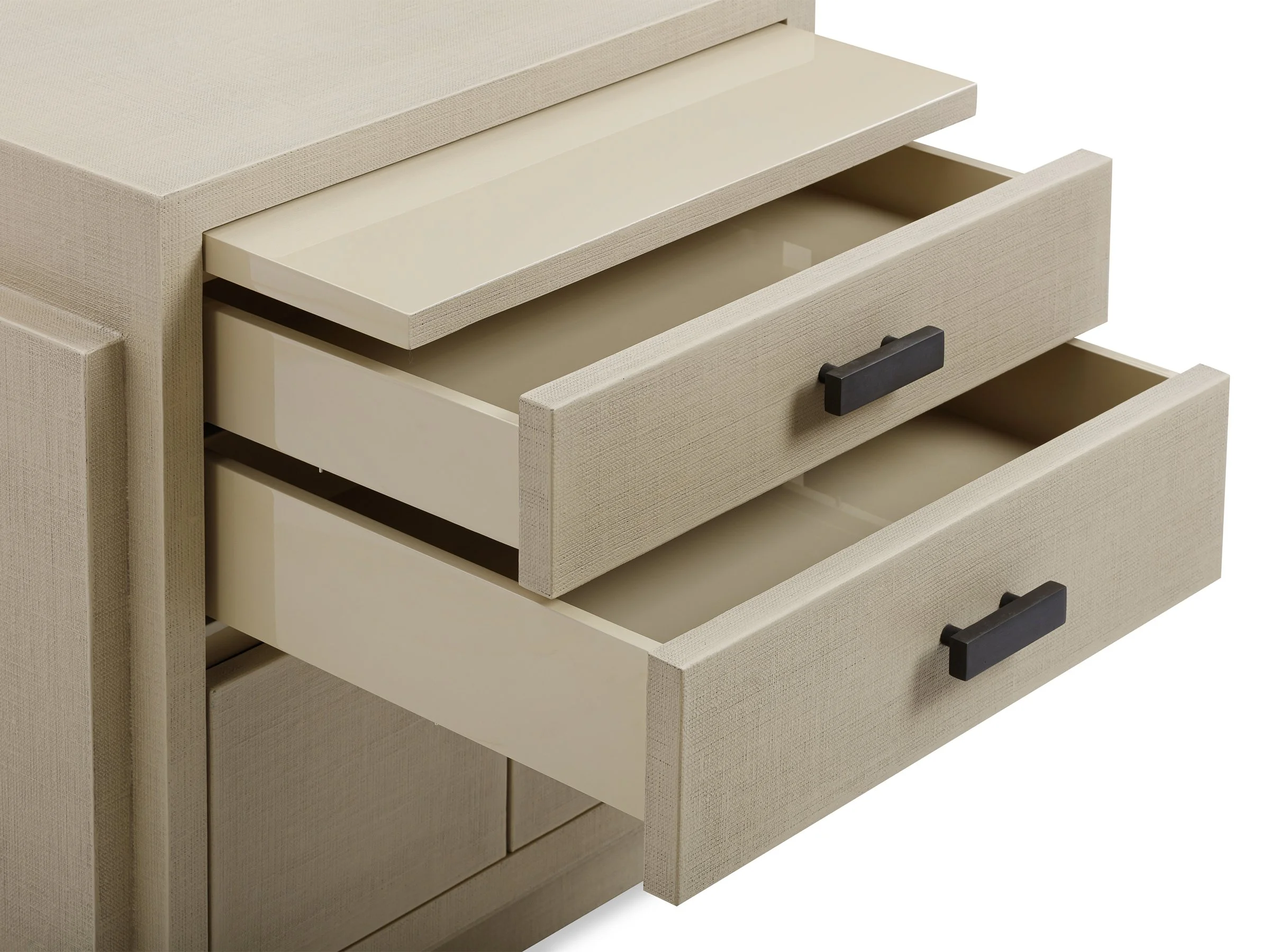 Close up view of Phillip Cabinet in Canvas Lacquered Linen with drawers open.