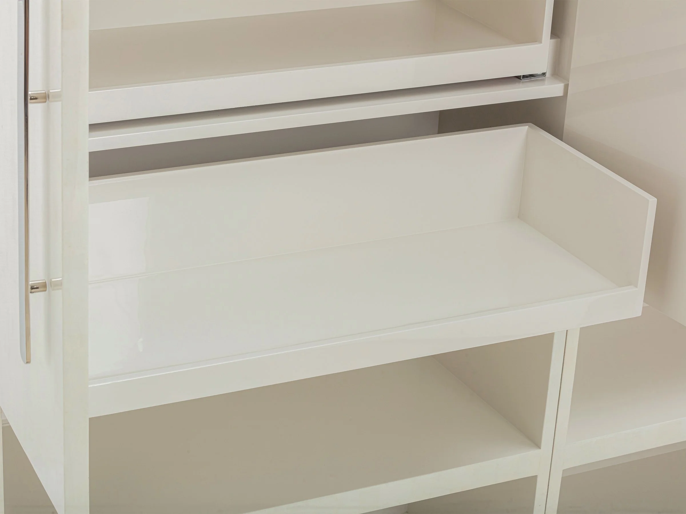 Detail of Glenn Armoire in white brushed eggshell lacquer