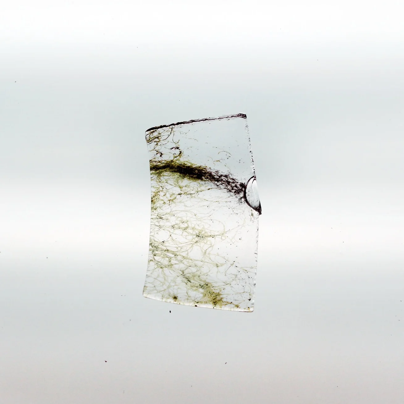Steel sandwiched between glass