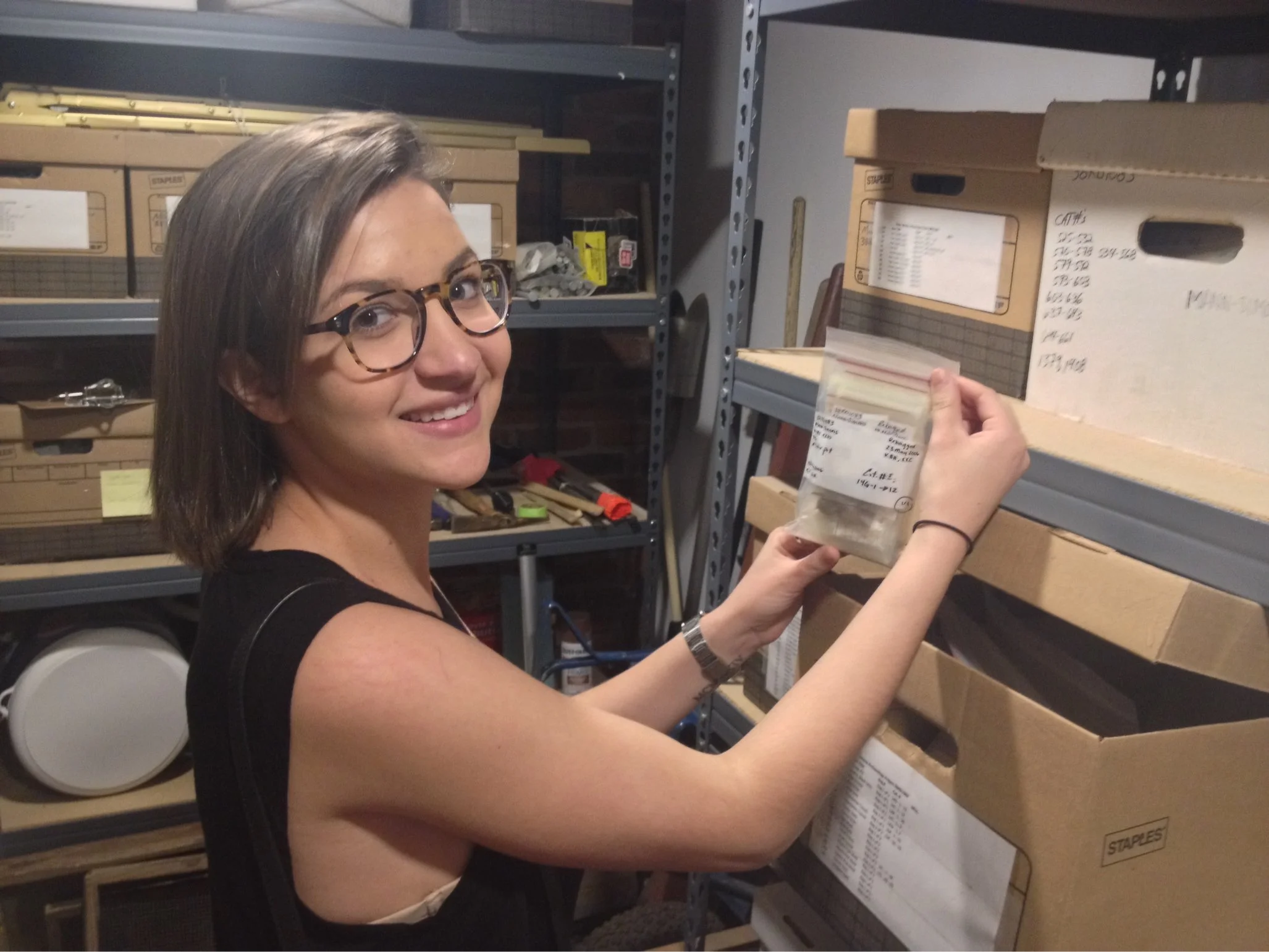 PCE Intern Corie Brooks taking a look at archive materials