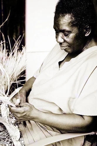 Geechee woman sweetgrass basket weaving, photo by Zak Collins. Charleston, SC