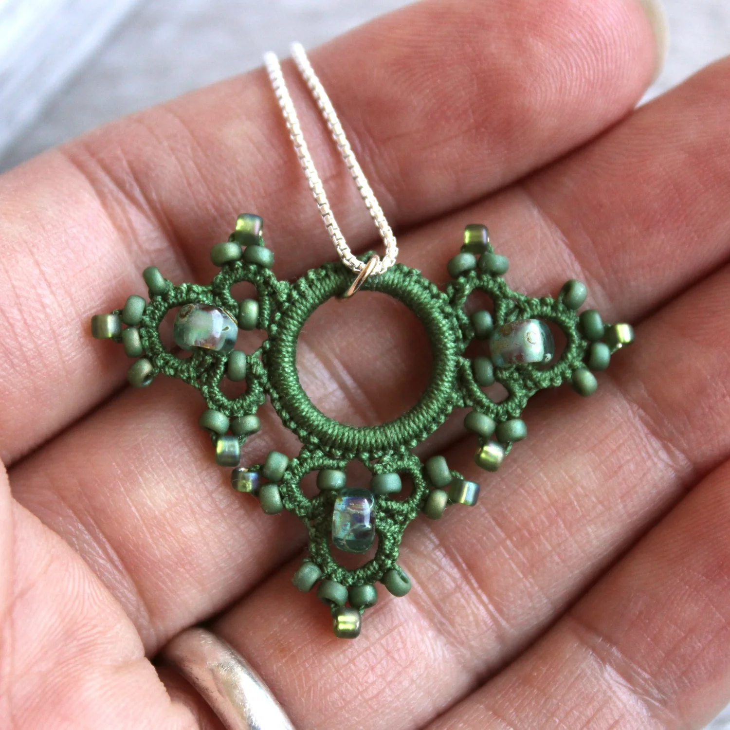fern_necklace_plain_hand.jpg