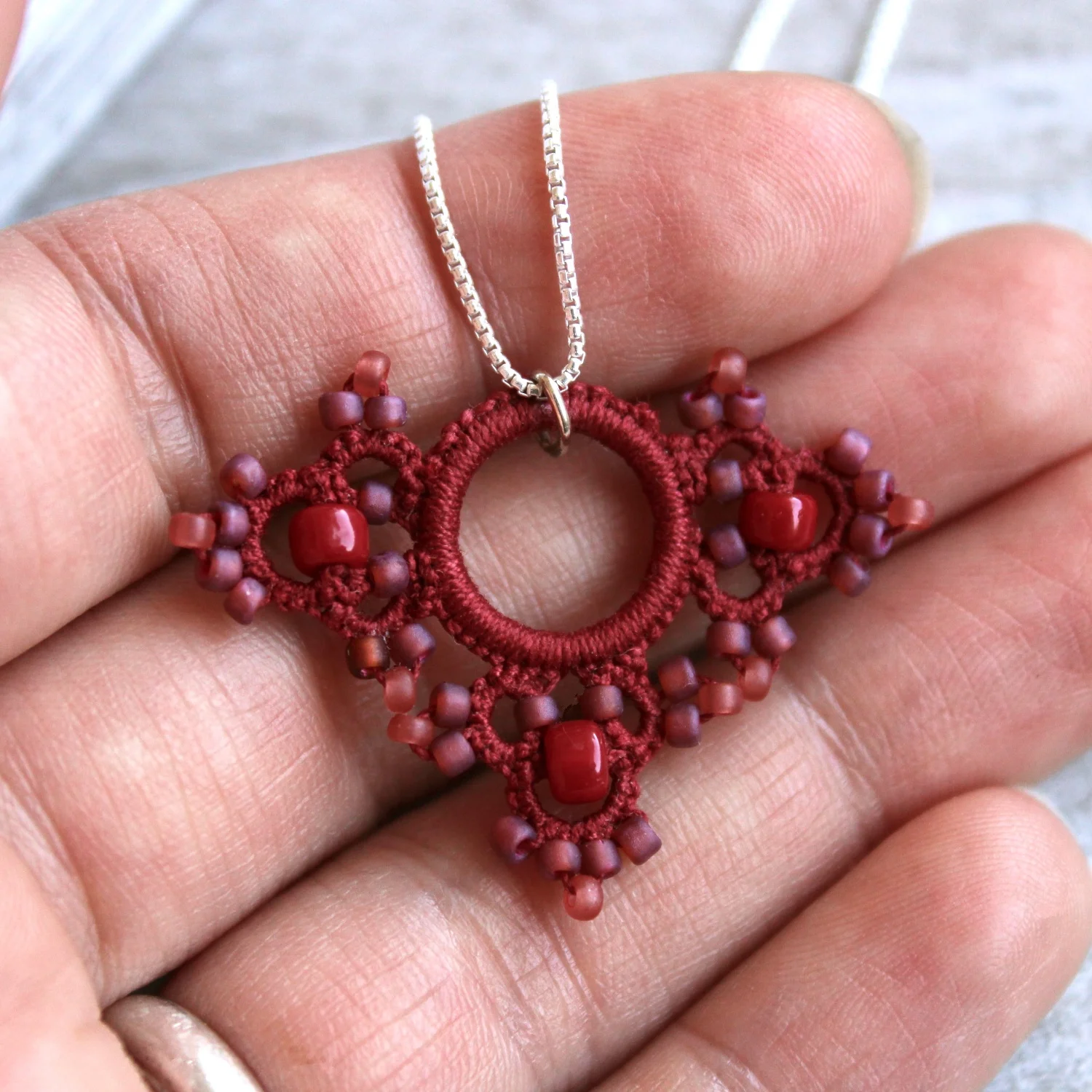 brightberry_necklace_plain_hand.jpg