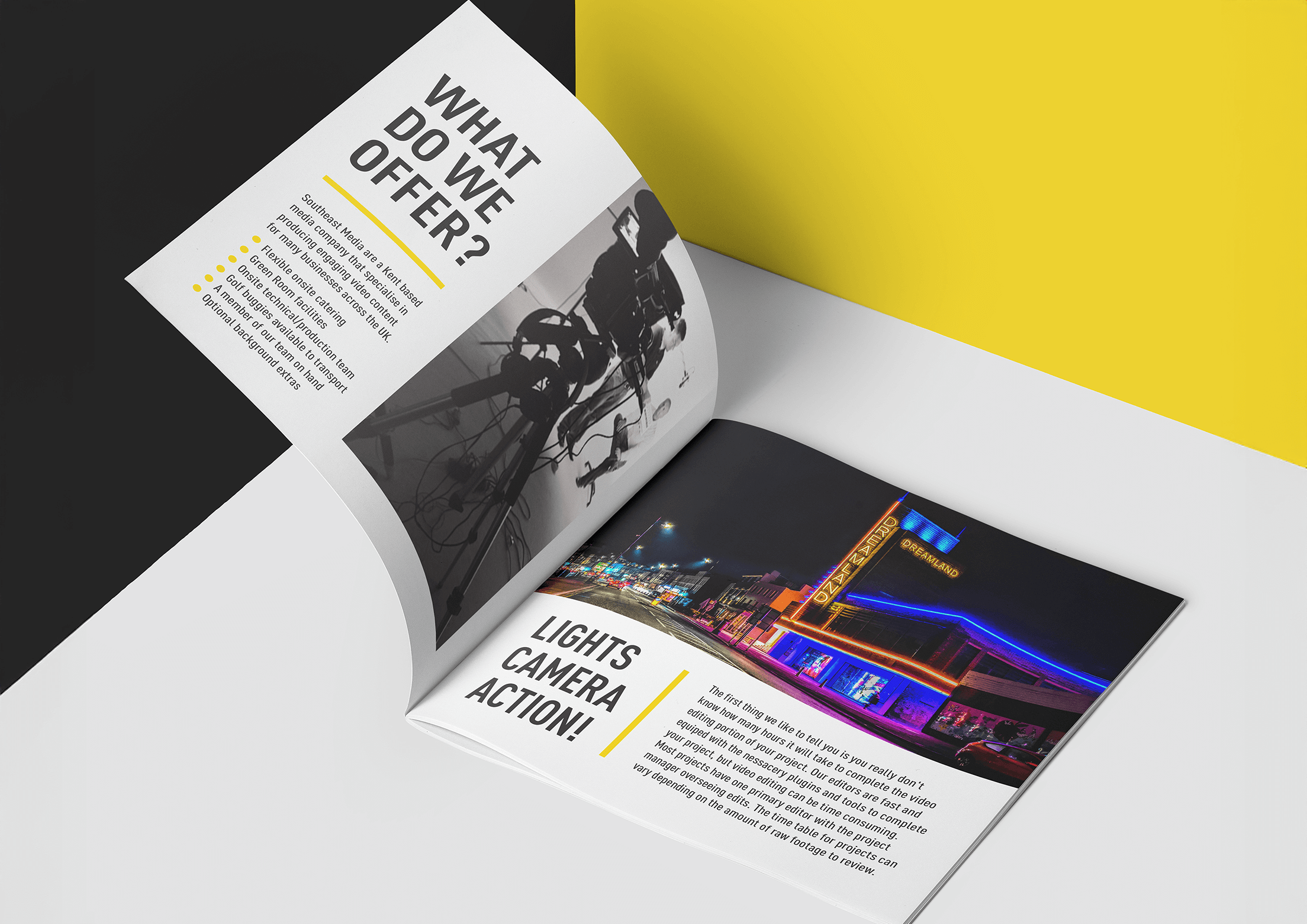 Open magazine with black and white photo of filming equipment and a color photo of a neon-lit building at night, with headlines reading 'What do we offer?' and 'Lights, camera, action!'