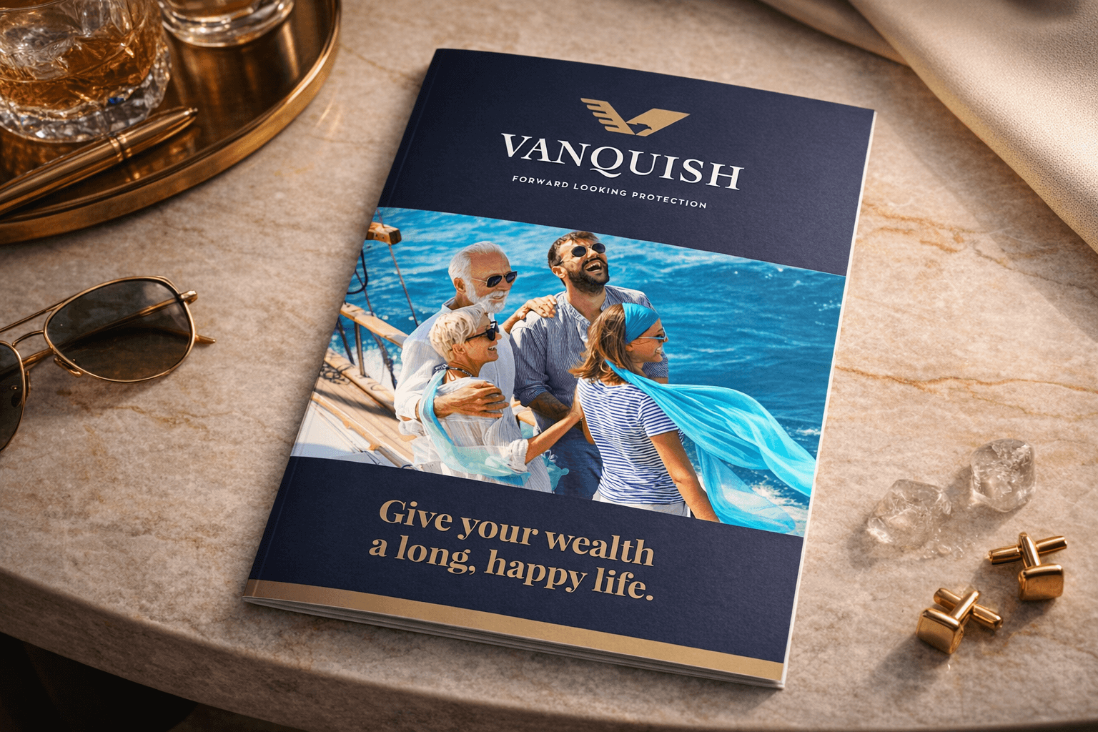 A brochure titled 'VANQUISH' with the subtitle 'Forward Looking Protection' and the message 'Give your wealth a long, happy life.' It features a photo of four people on a boat near the water, wearing sunglasses and summer clothing.