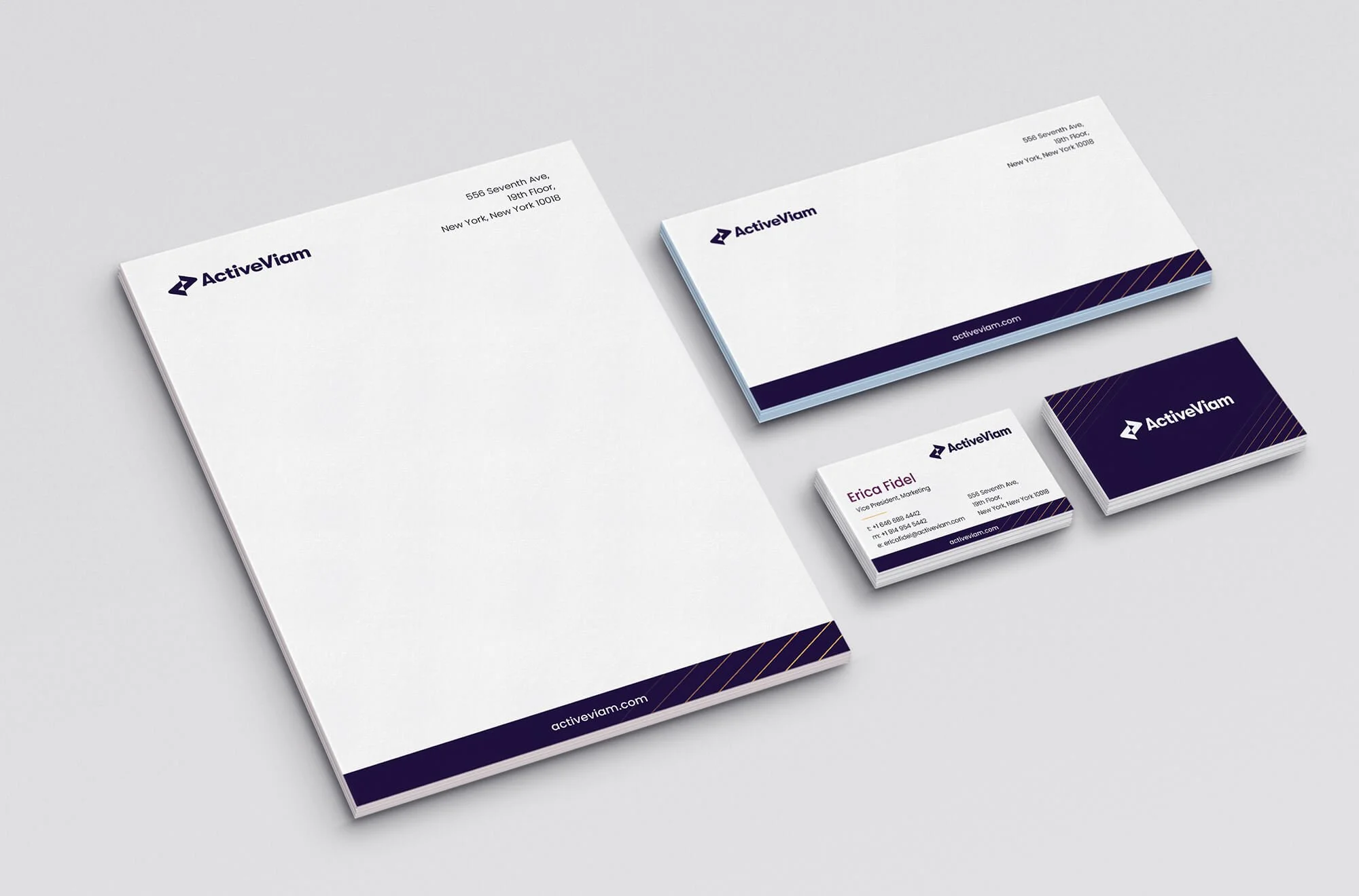 Set of branded business stationery for ActiveViam, including letterhead, envelopes, and business cards, with a white background and navy blue and gold accents.