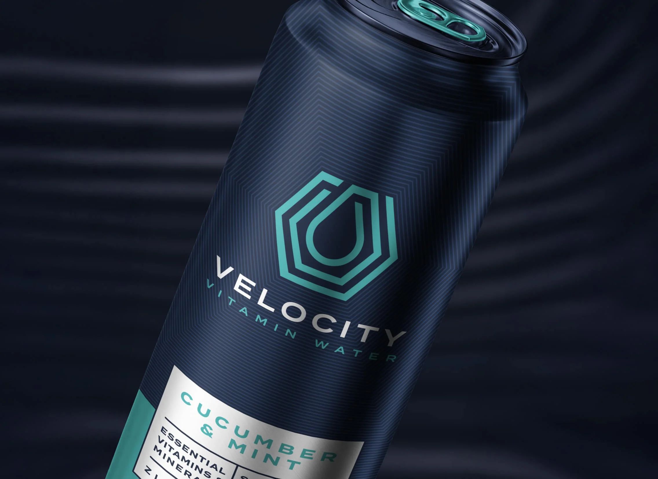 A can of Velocity Vitamin Water with a dark blue background and modern logo design.
