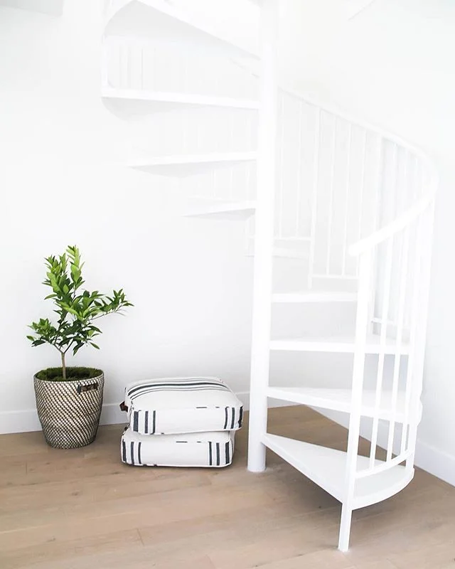 It’s amazing what a coat of paint can do! This once black metal spiral staircase was the eyesore of the home. Dark, bulky, outdated. But it is now a beautiful feature, enhancing the character of the space! (Getting rid of the ugly floor tile an