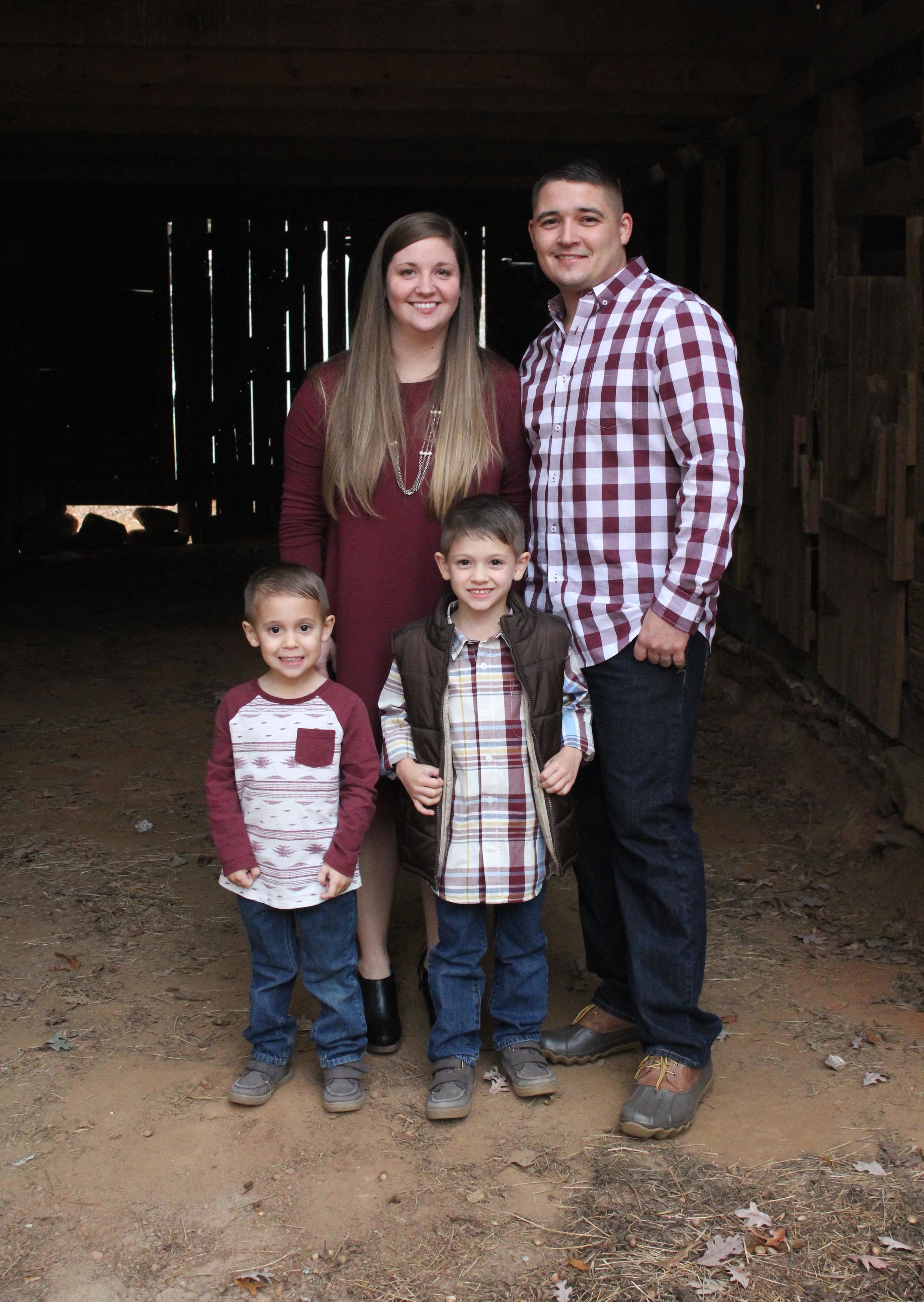 Morrison family in barn.jpg