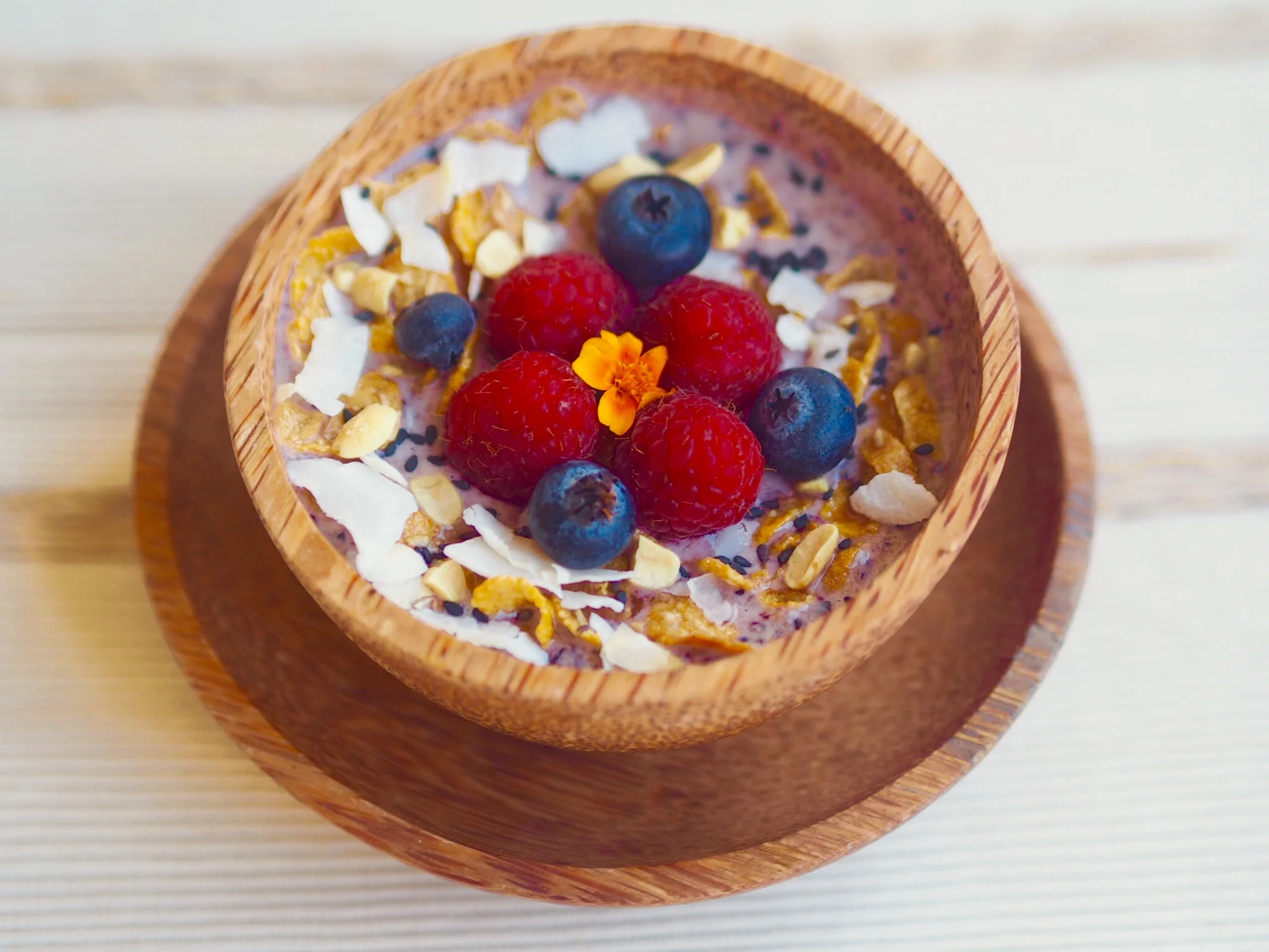 Red raspberry almond milk bowl