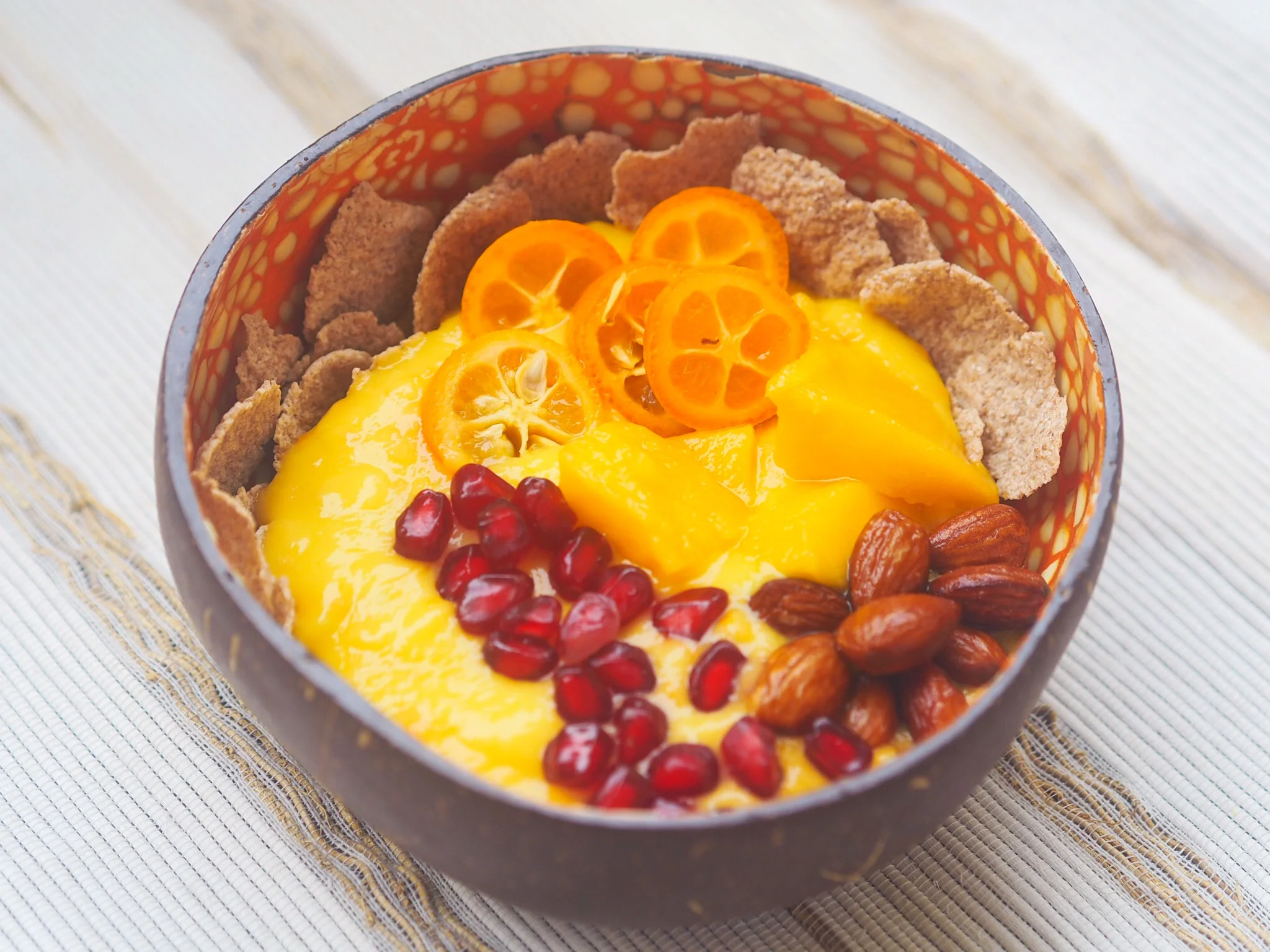 Kumquat-mango soy yogurt bowl