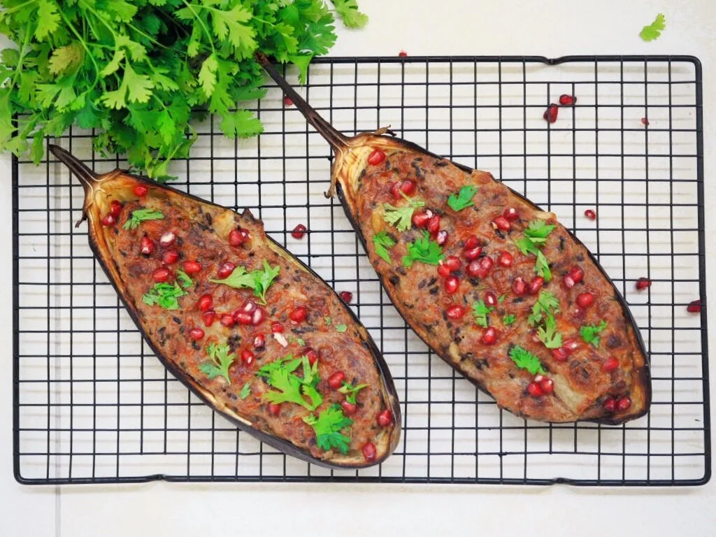 Stuffed eggplant with coconut rice and pomegranate
