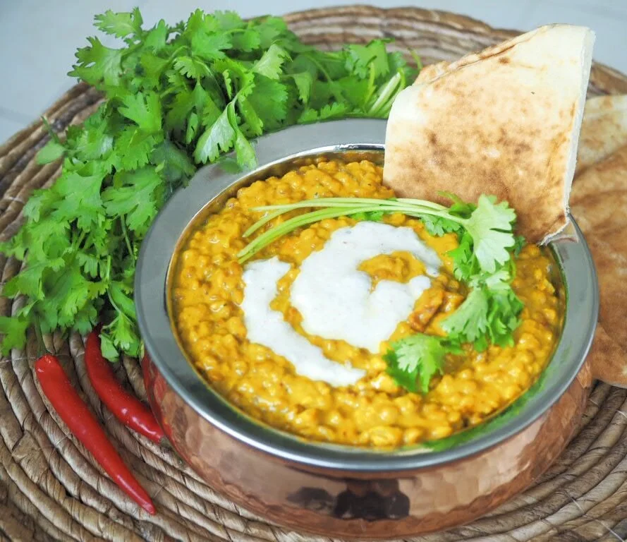 Creamy coconut curry lentils with indian raita