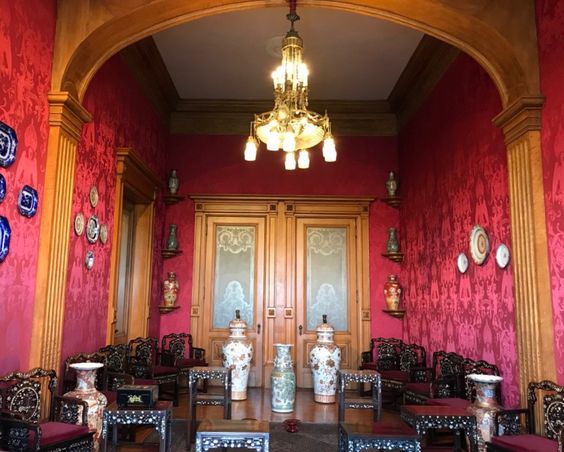Interior room of a photo we took at Chapultepec Castle (Carmine Lake dyed fabric on the walls)