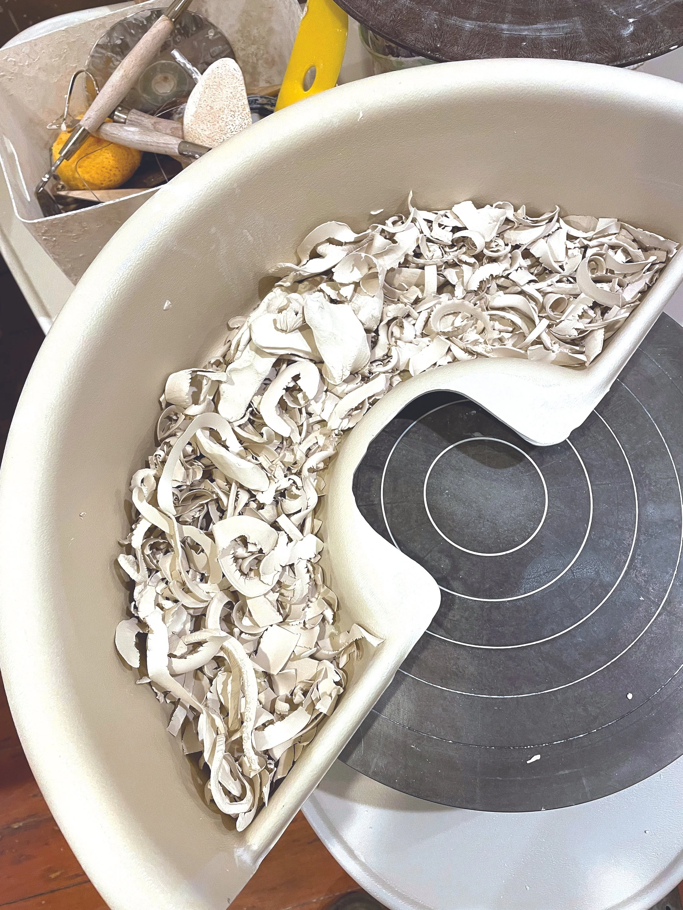 (13) There are a couple of options for your slip 1. You can use a commercial underglaze or 2. Make your own slip. Clay trimmings slaked down into a slip with the consistency of pudding is where I start.jpg